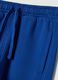 Pantaloni jogger blu in puro cotone organico con stampa_3