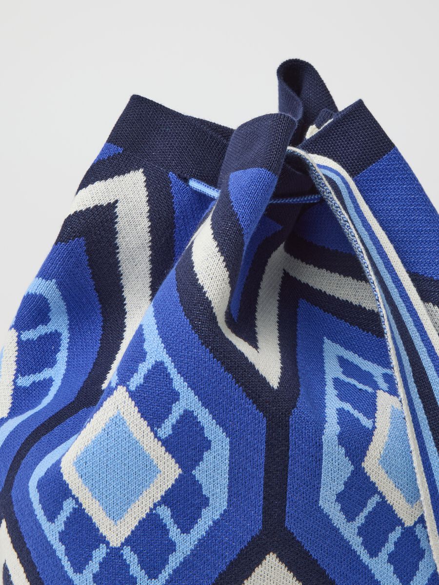 Shoulder bag with geometric motif and tassels_1
