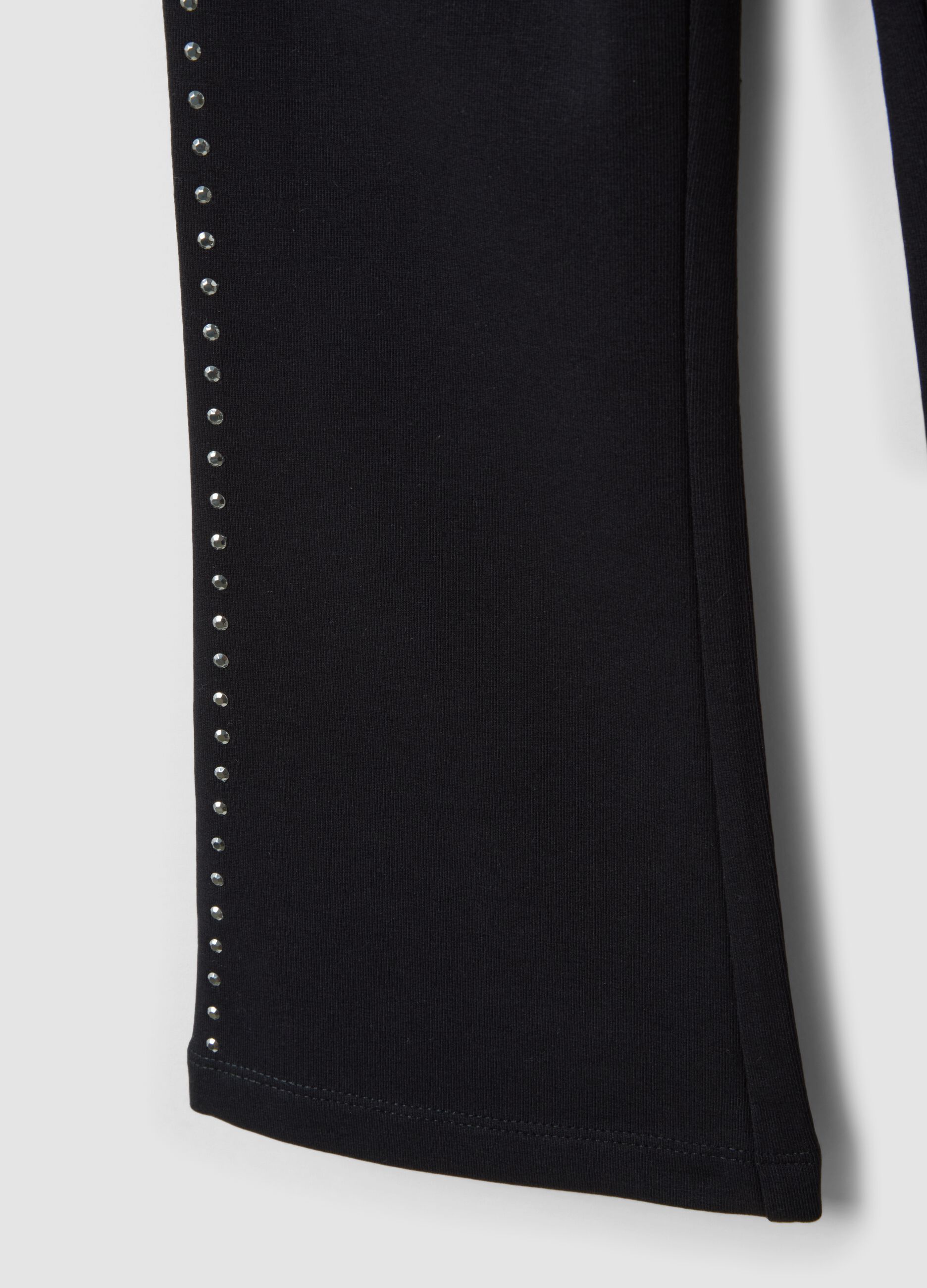 Leggings neri flare in cotone elasticizzato con borchie