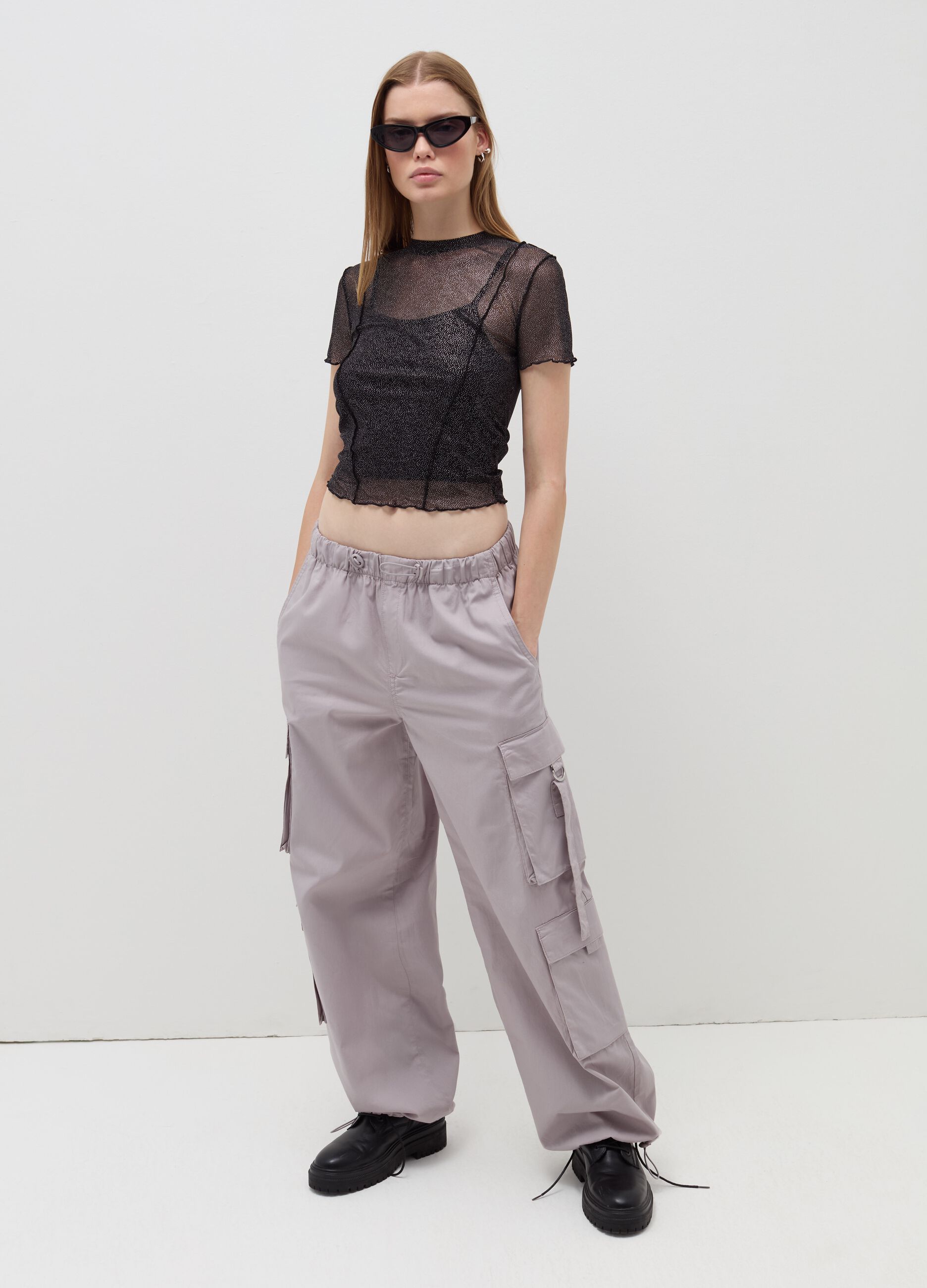 B. ANGEL T-shirt crop in mesh con profili ondulati