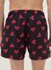 Black beach boxers with Keith Haring heart prints_2