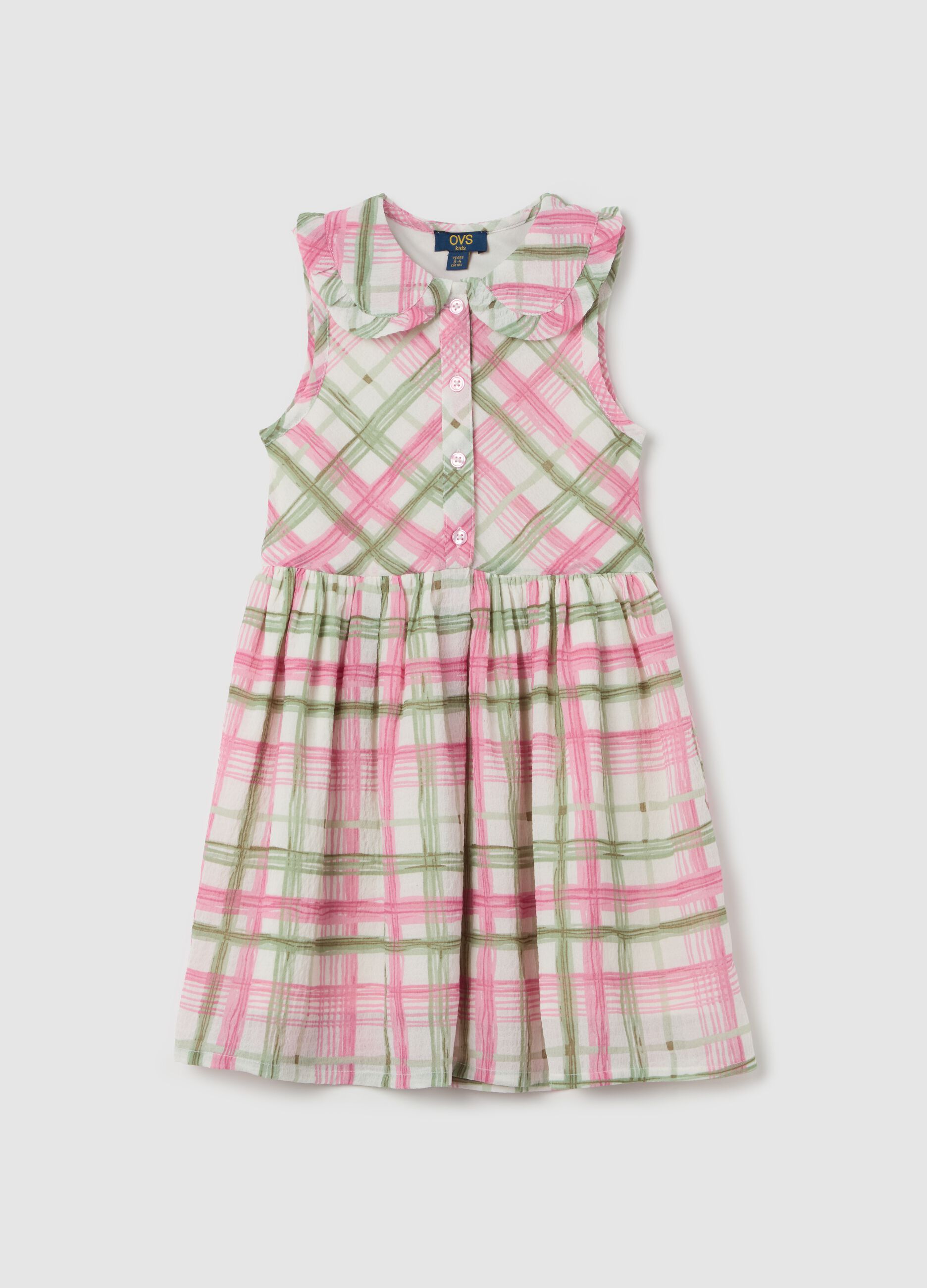 Sleeveless dress with check pattern