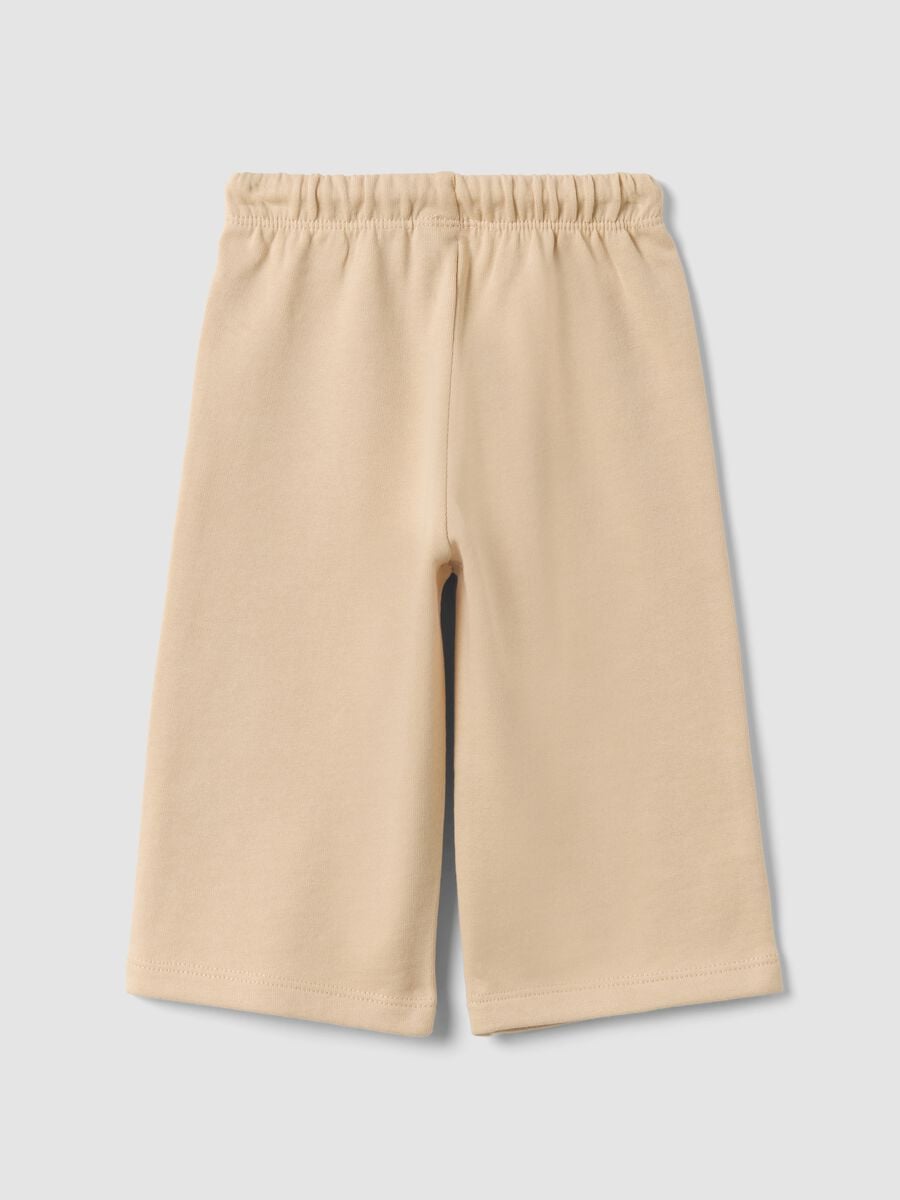Beige pure cotton trousers with elasticated waist and print for baby girl_1