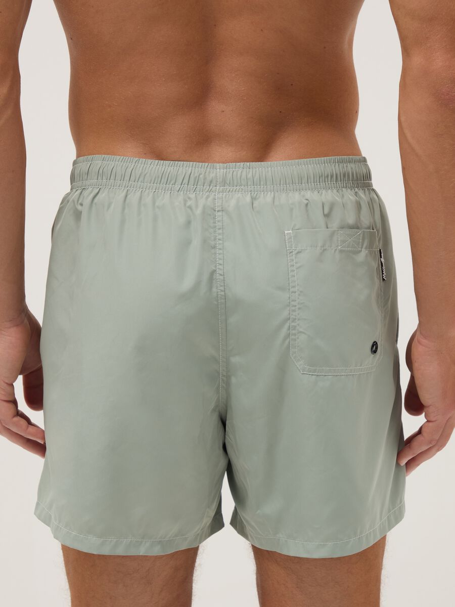 Green swim shorts with elasticated waistband and drawstring_3