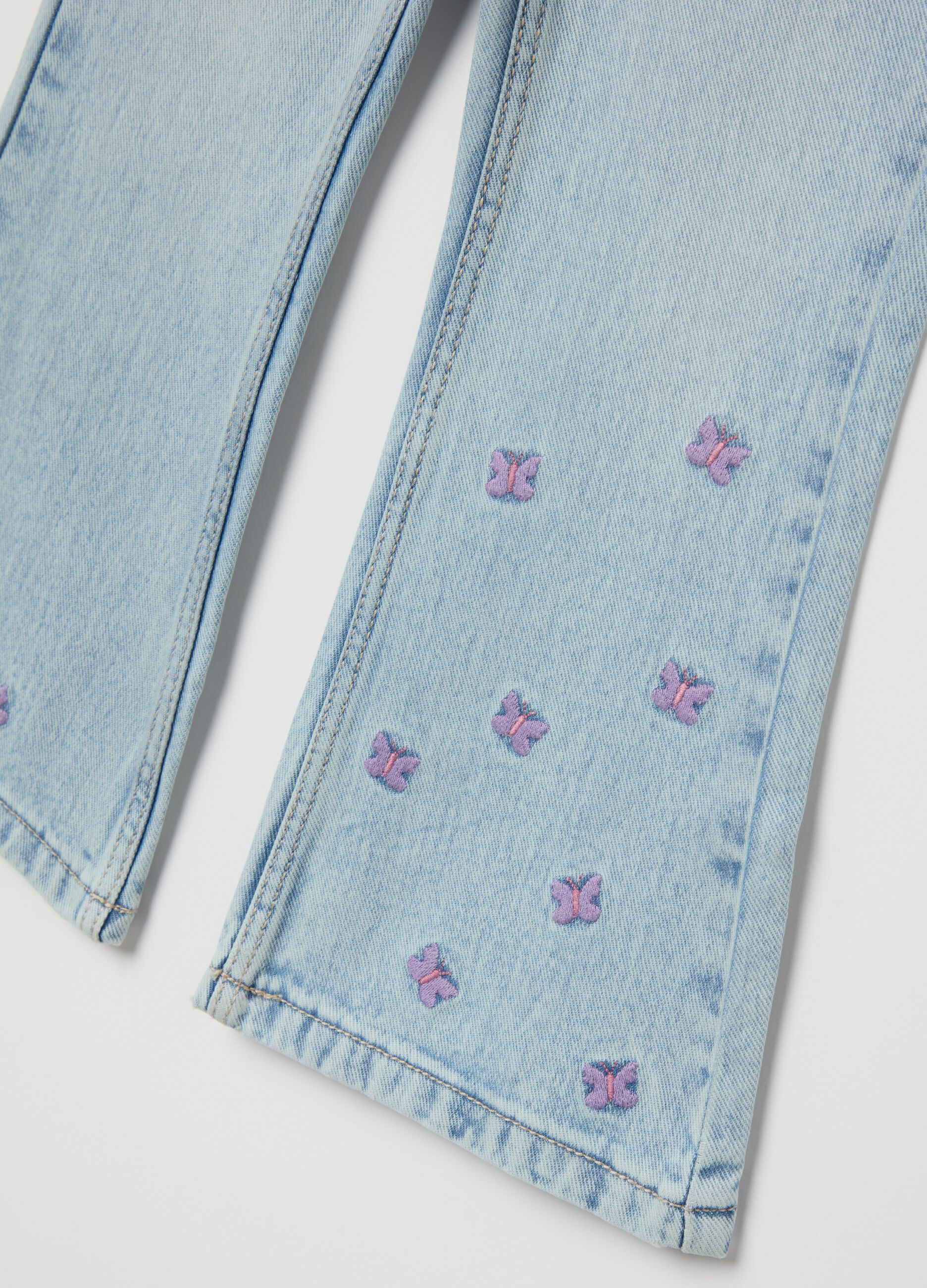 Flare-fit jeans with five pockets and butterflies embroidery