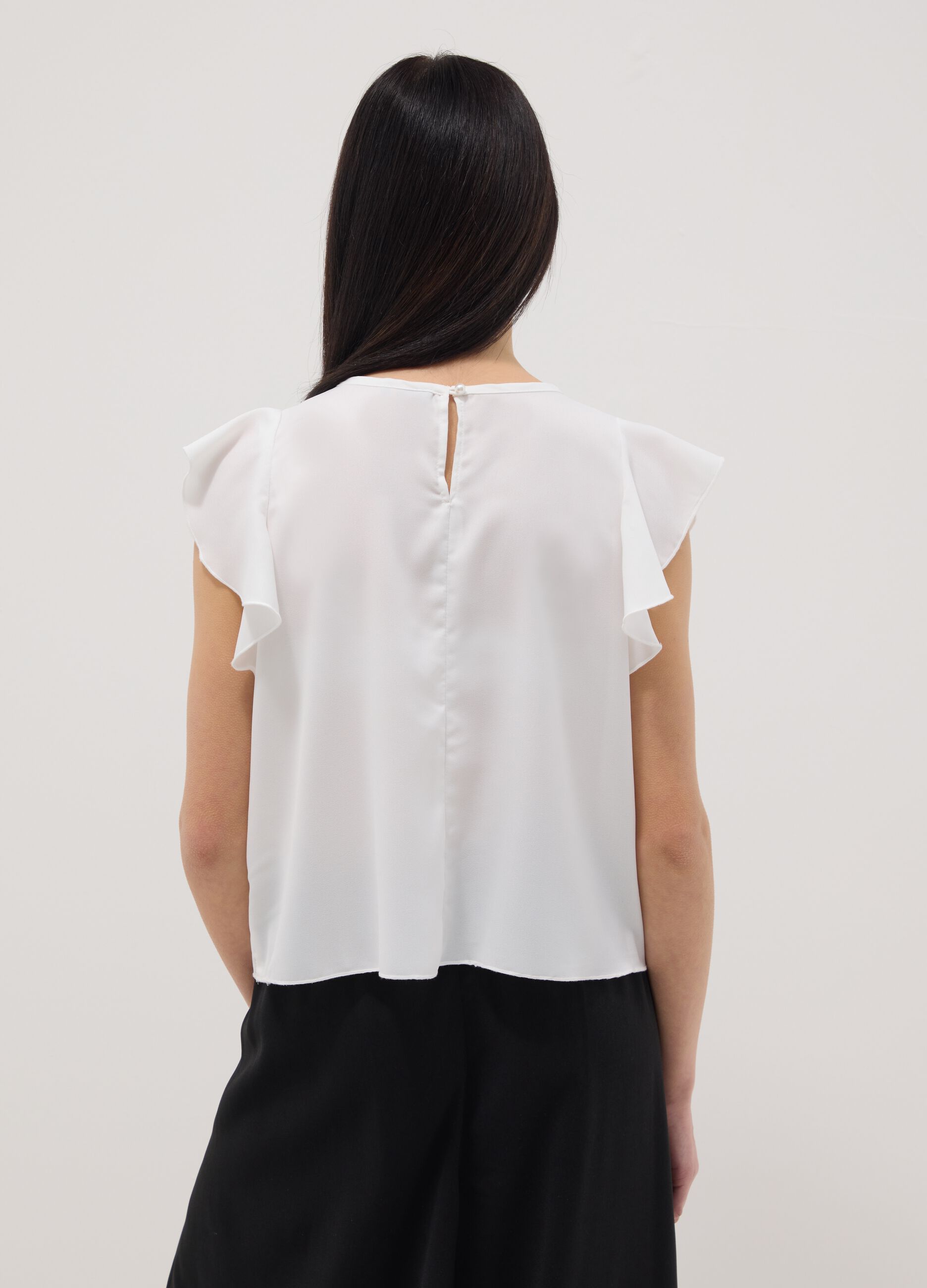 White regular fit girl's blouse with ruffled sleeves