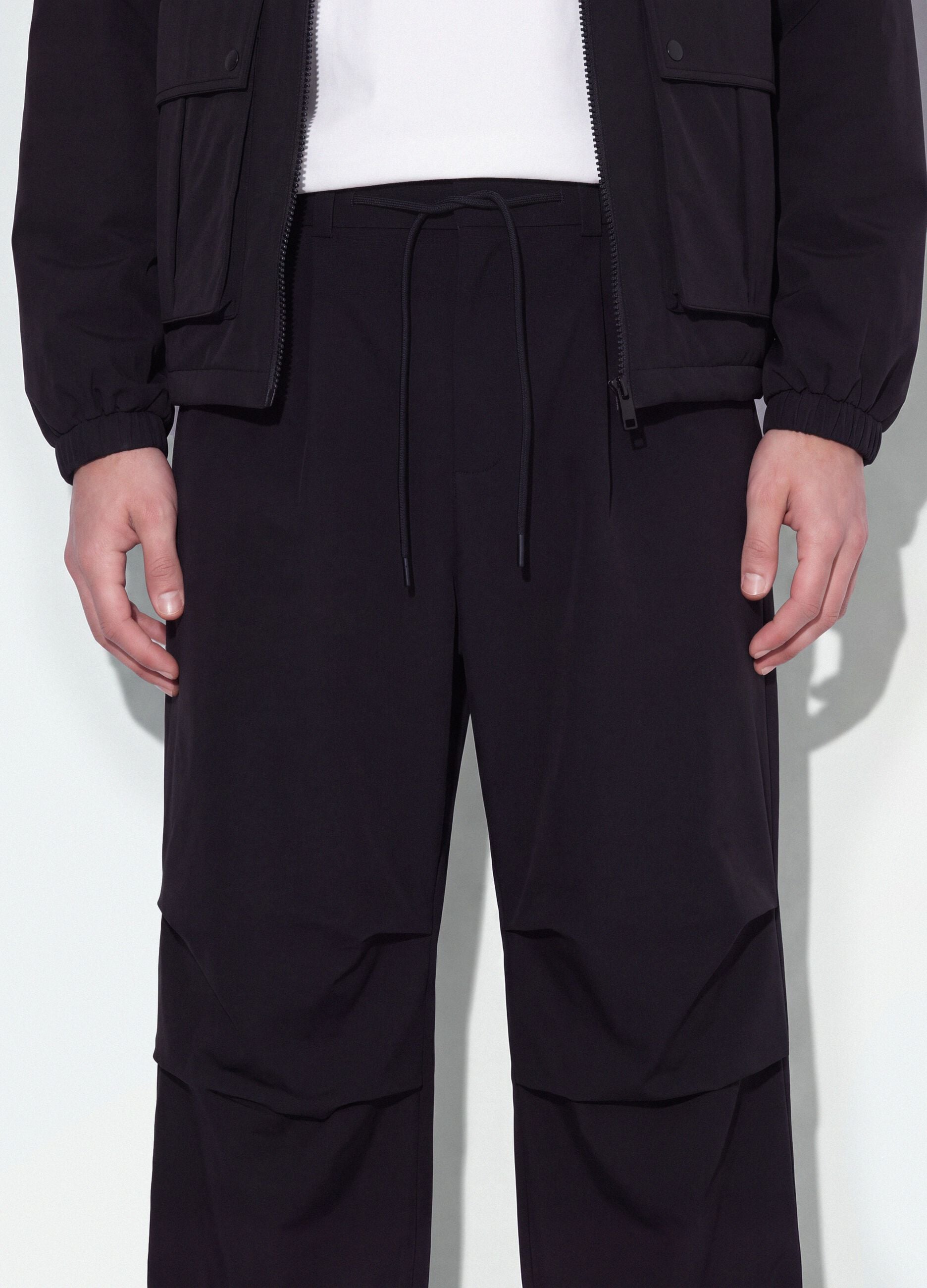 Black stretch-fabric parachute-fit trousers