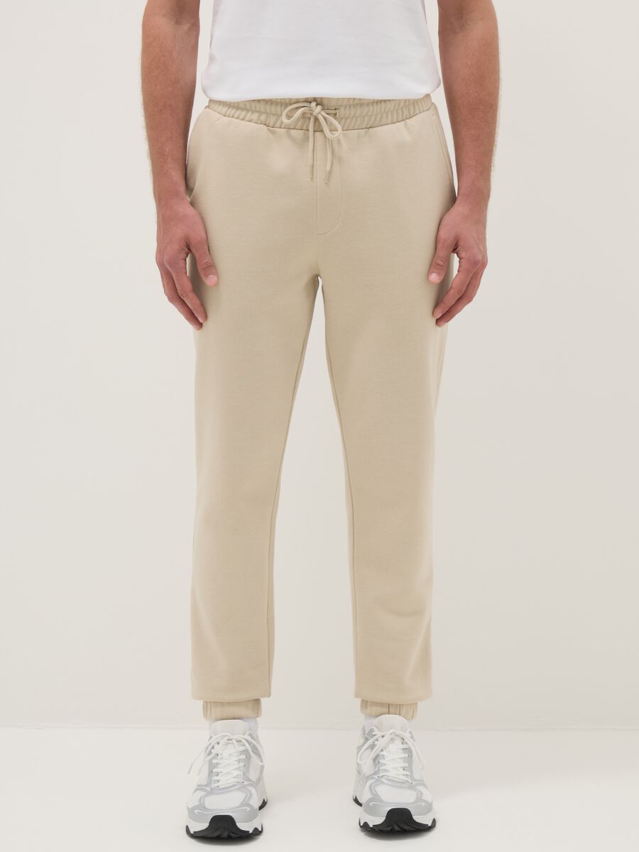 Beige cotton blend jogger trousers regular fit_1