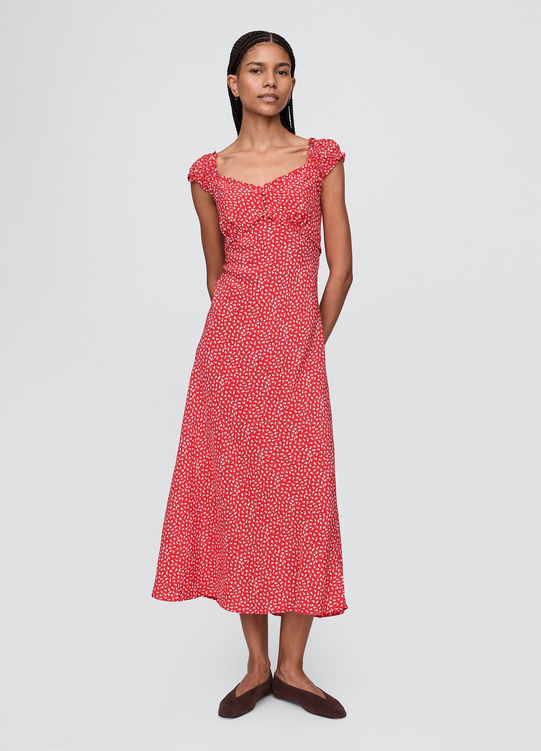 Sleeveless dress with floral pattern