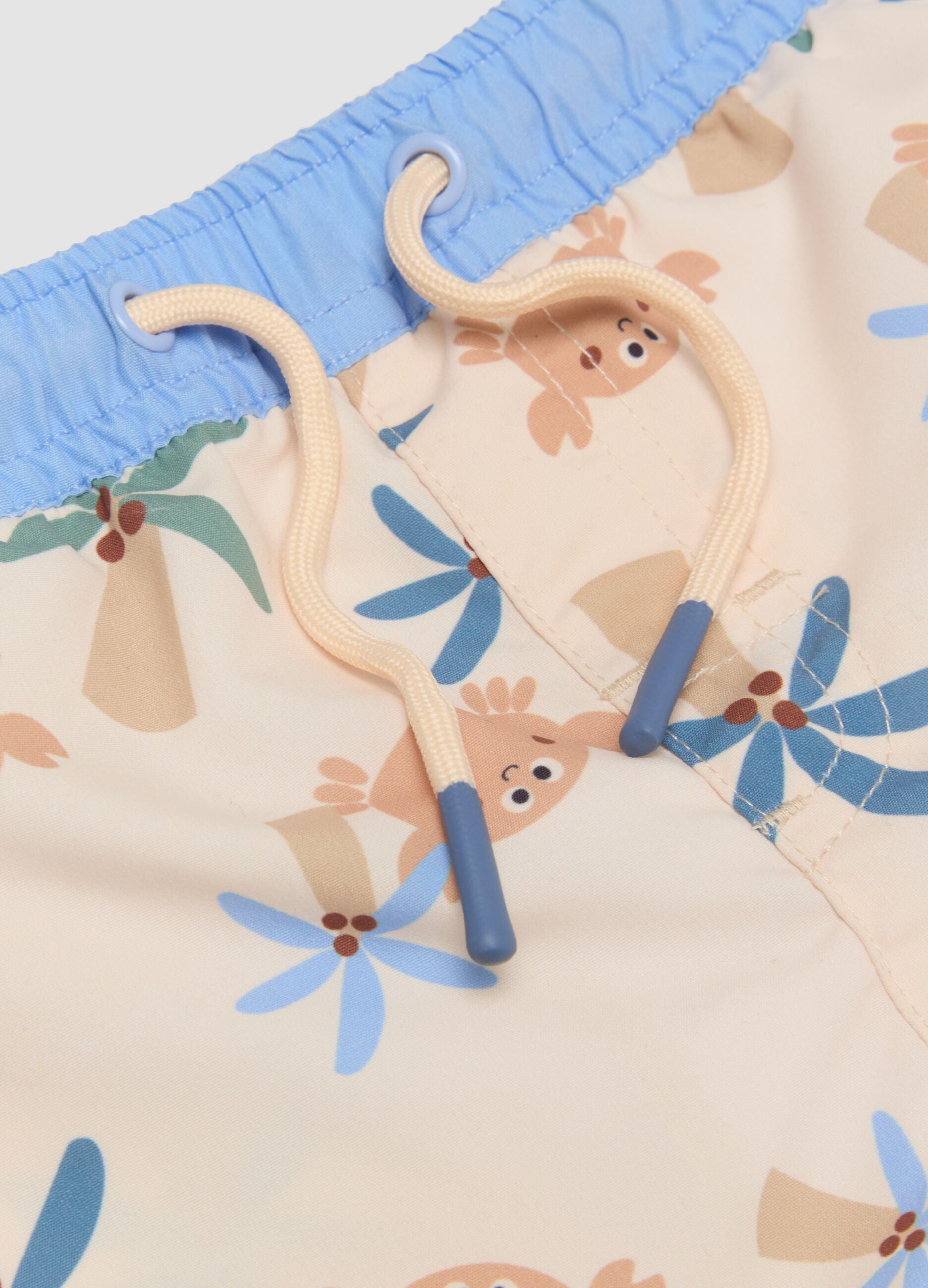 Beige tropical-print swim shorts for baby boys