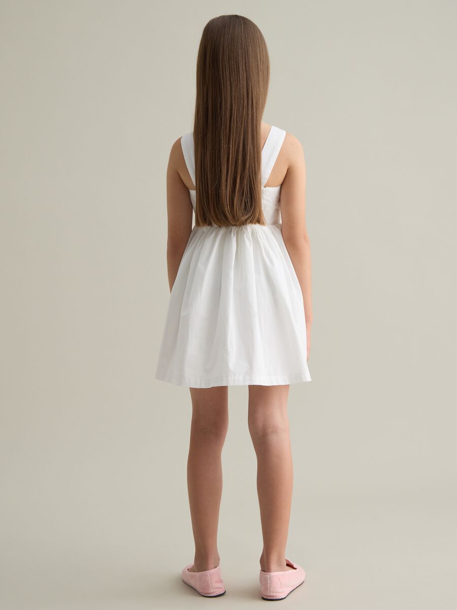 Sleeveless white dress with colourful floral prints PIOMBO Kids_2