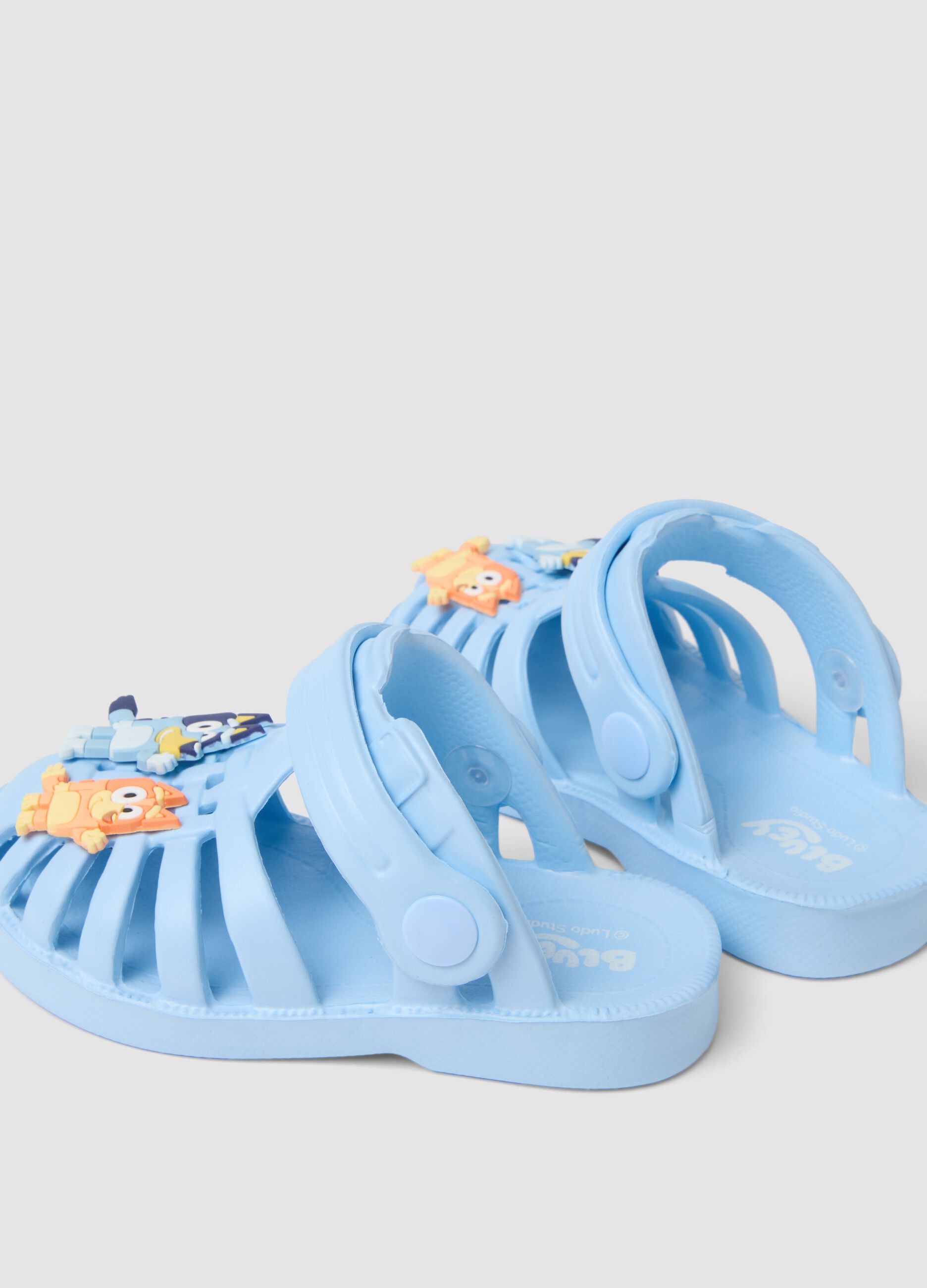 Baby blue sandals with decorative appliqu&eacute;s