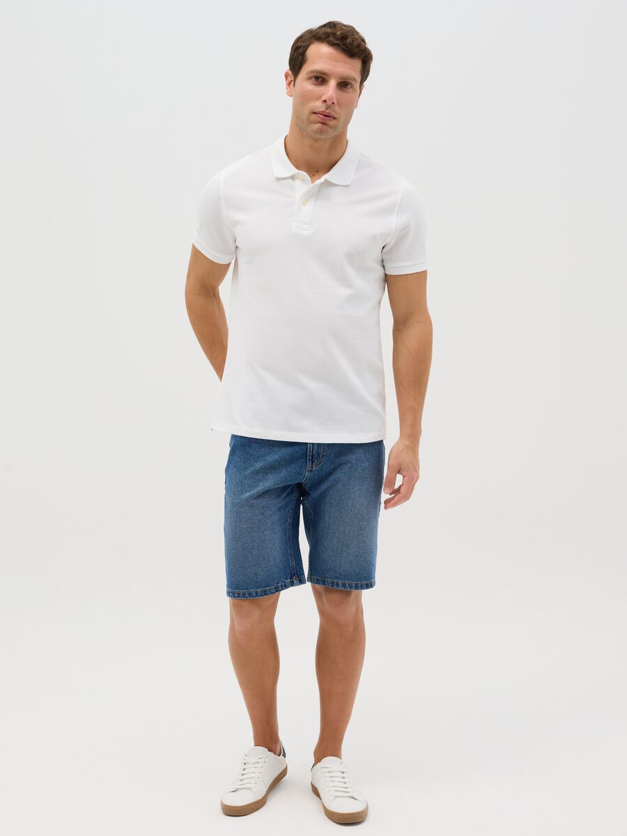 Light blue slim-fit Bermuda shorts in denim_0