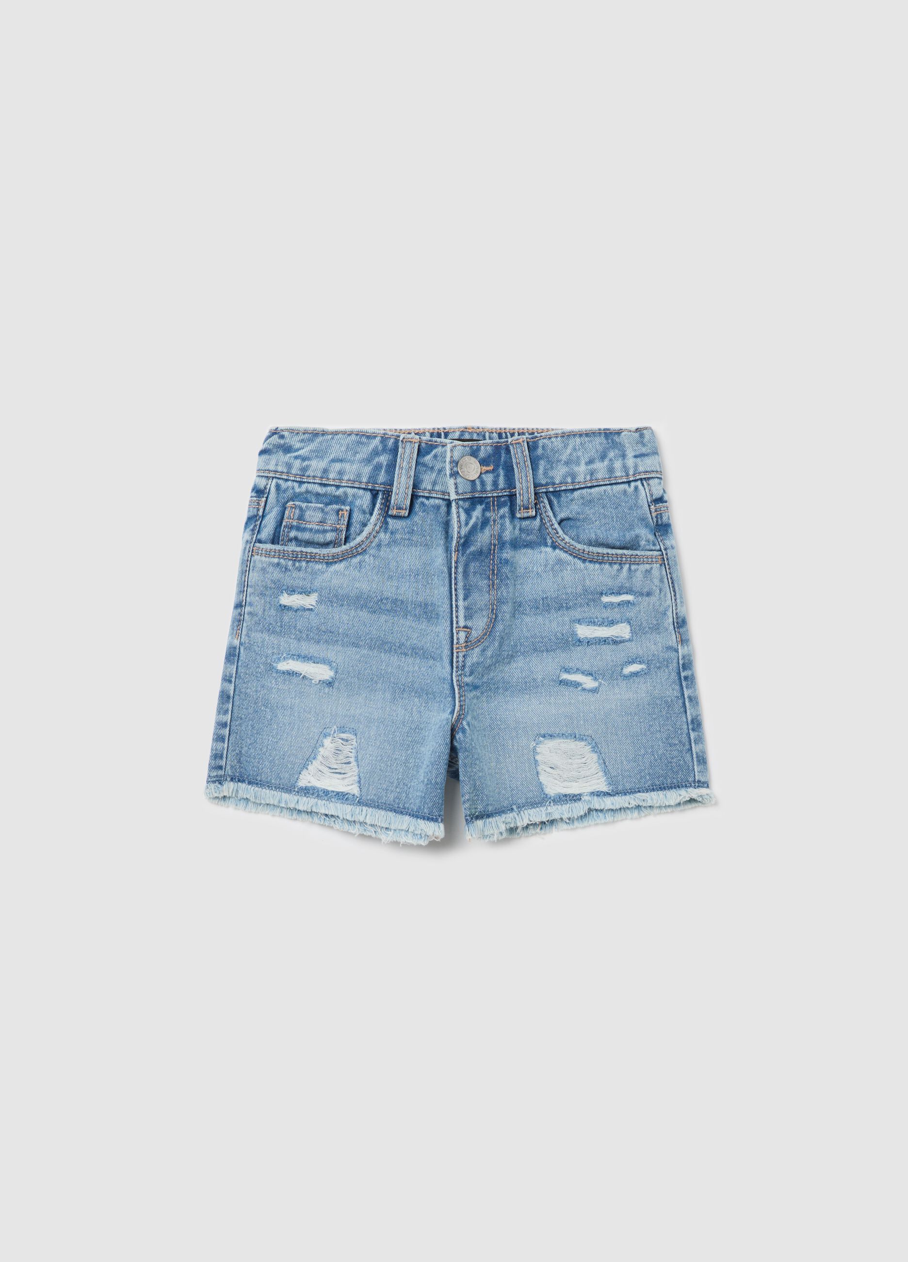 Denim shorts with five pockets and abrasions