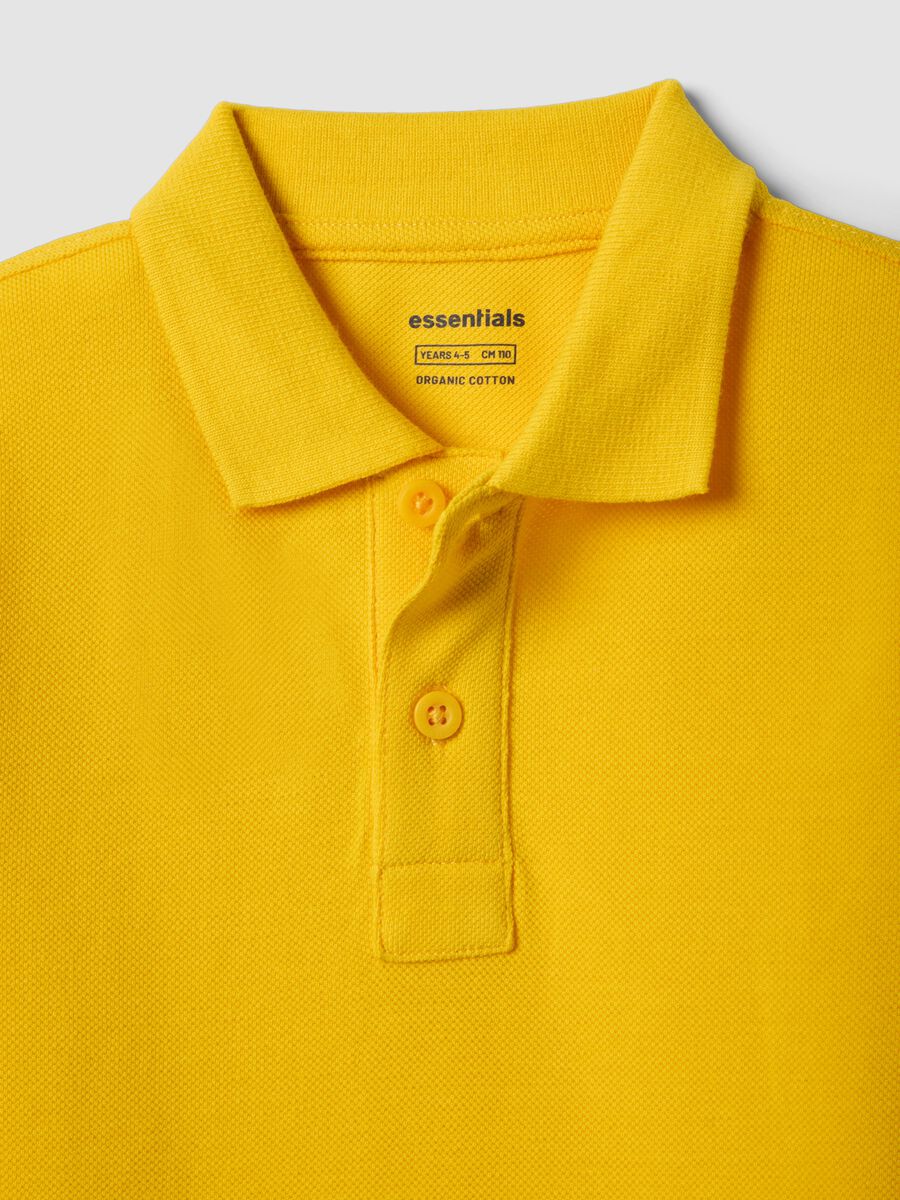 Polo a maniche corte gialla in puro cotone organico da bambino_2
