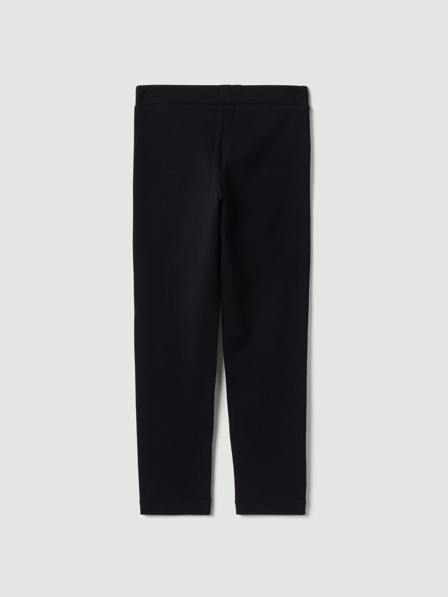 Leggings neri in cotone organico elasticizzato skinny fit per bambina_1