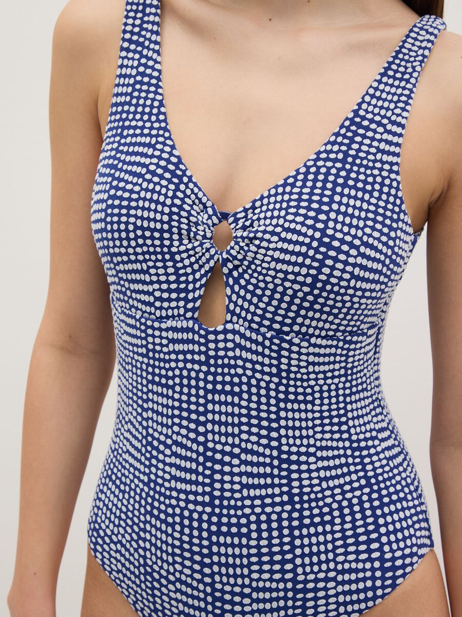 Blue one-piece swimsuit with geometric pattern_2