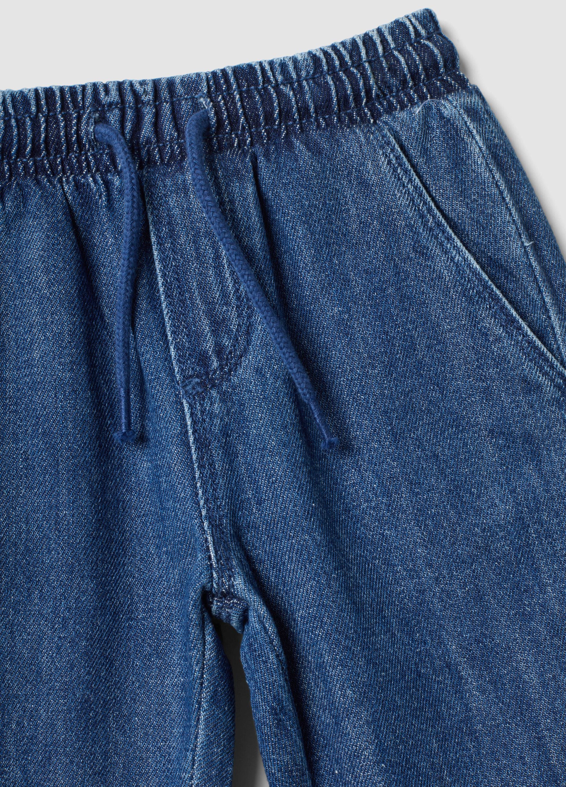 Blue denim trousers in a cotton and viscose blend with elasticated waist