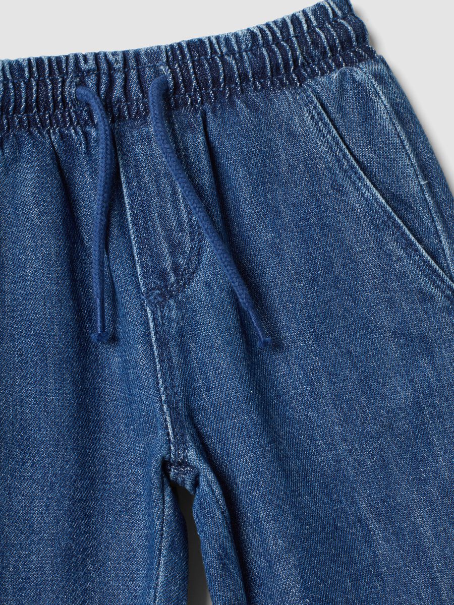 Blue denim trousers in a cotton and viscose blend with elasticated waist_2