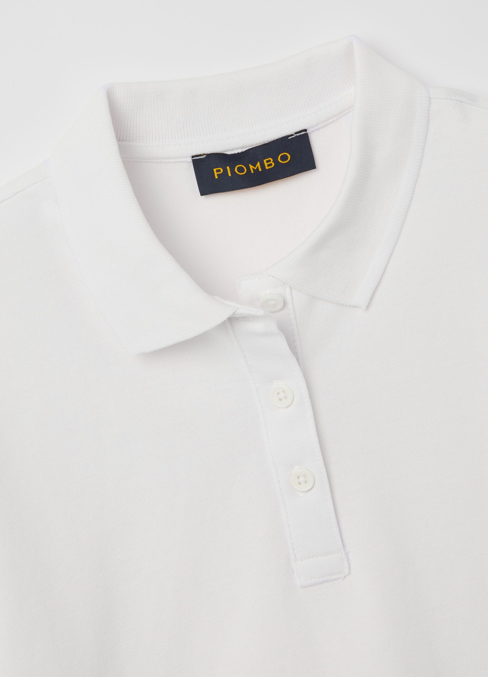 White short-sleeved polo shirt in piquet