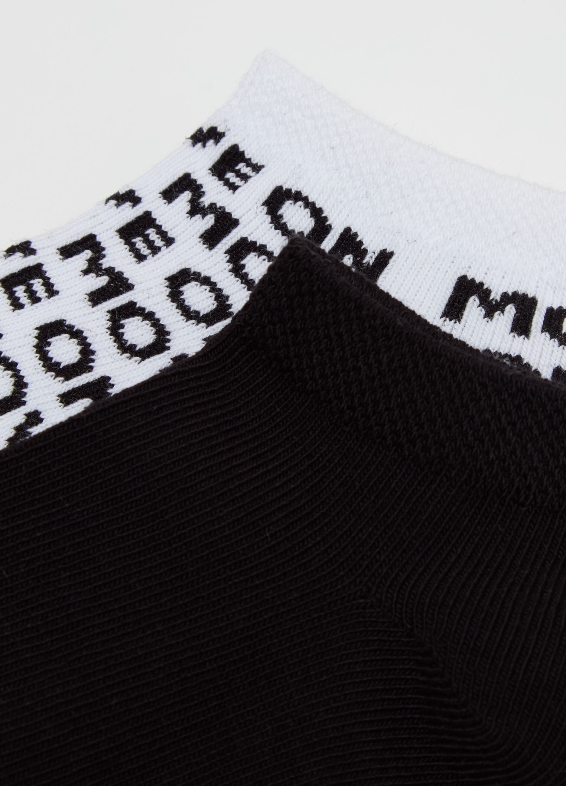 Three-pair pack stretch shoe liners with "Move On" lettering