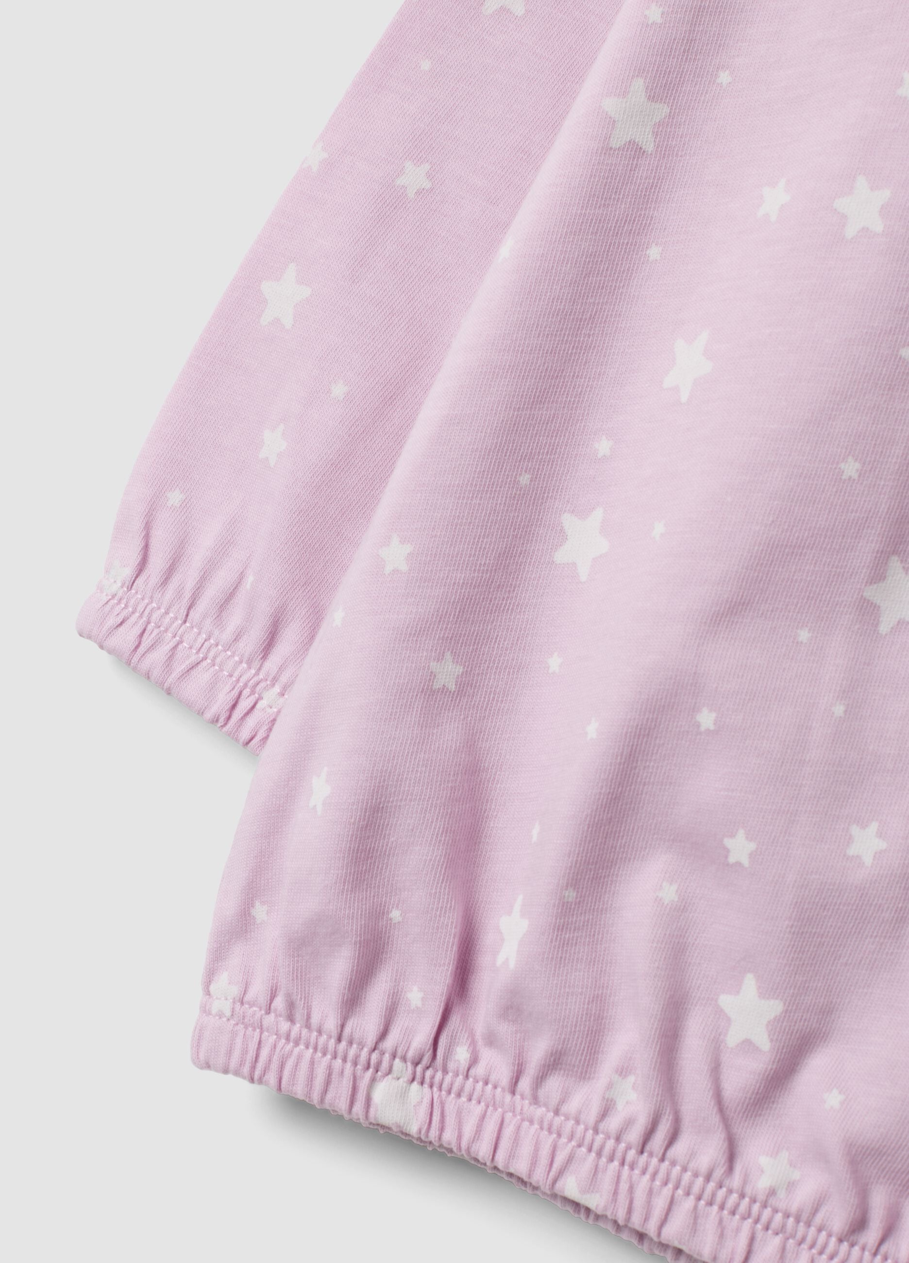 Pink organic cotton jersey pyjamas with star print