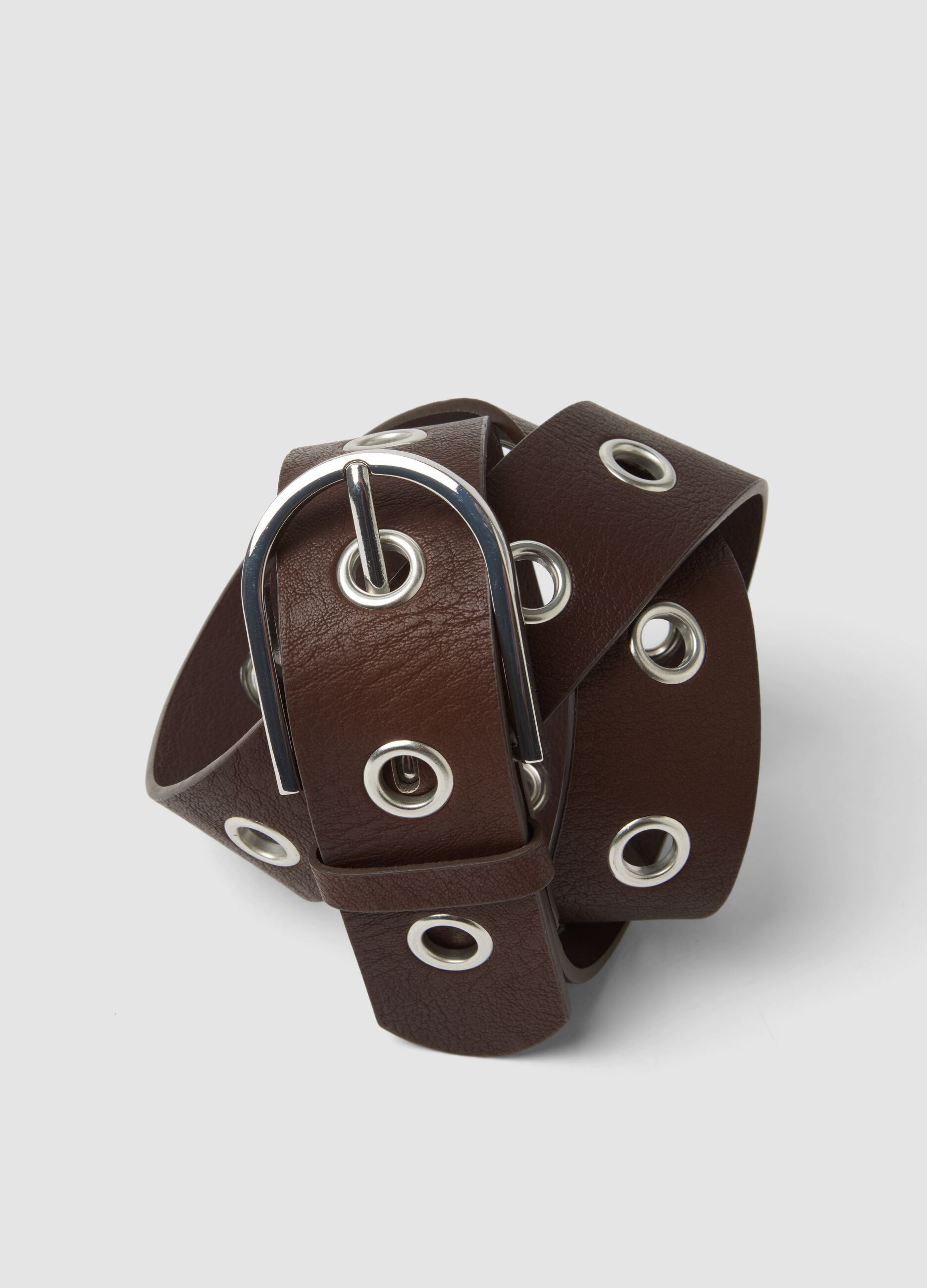 Brown belt with metal eyelets