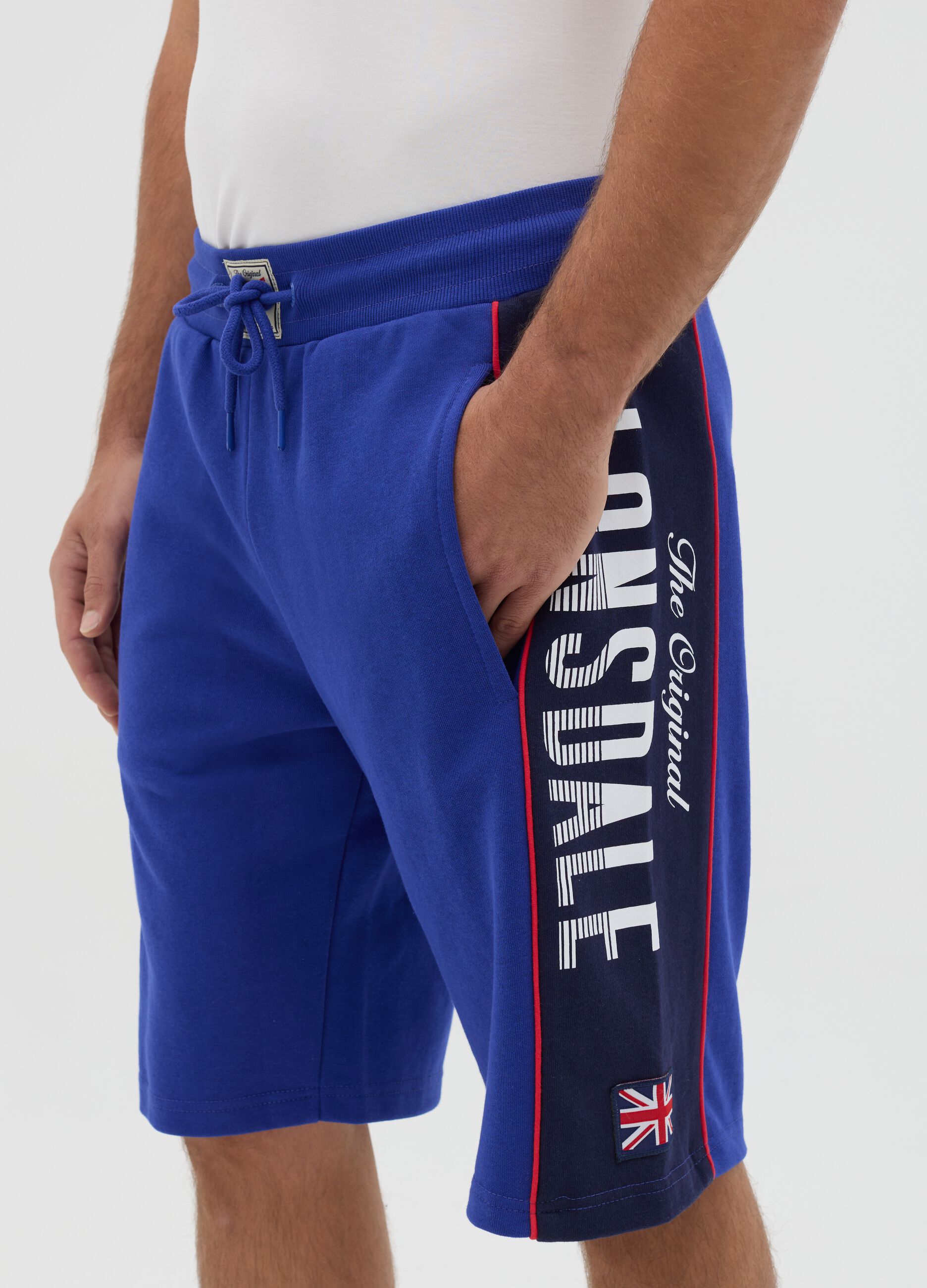 Blue sports Bermuda shorts with logo