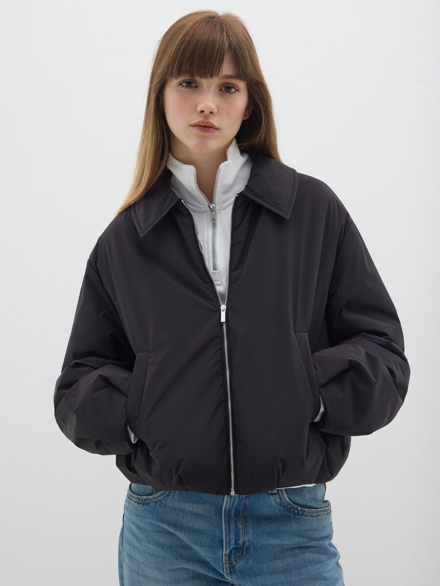 Giacca nera imbottita regular fit e zip_0