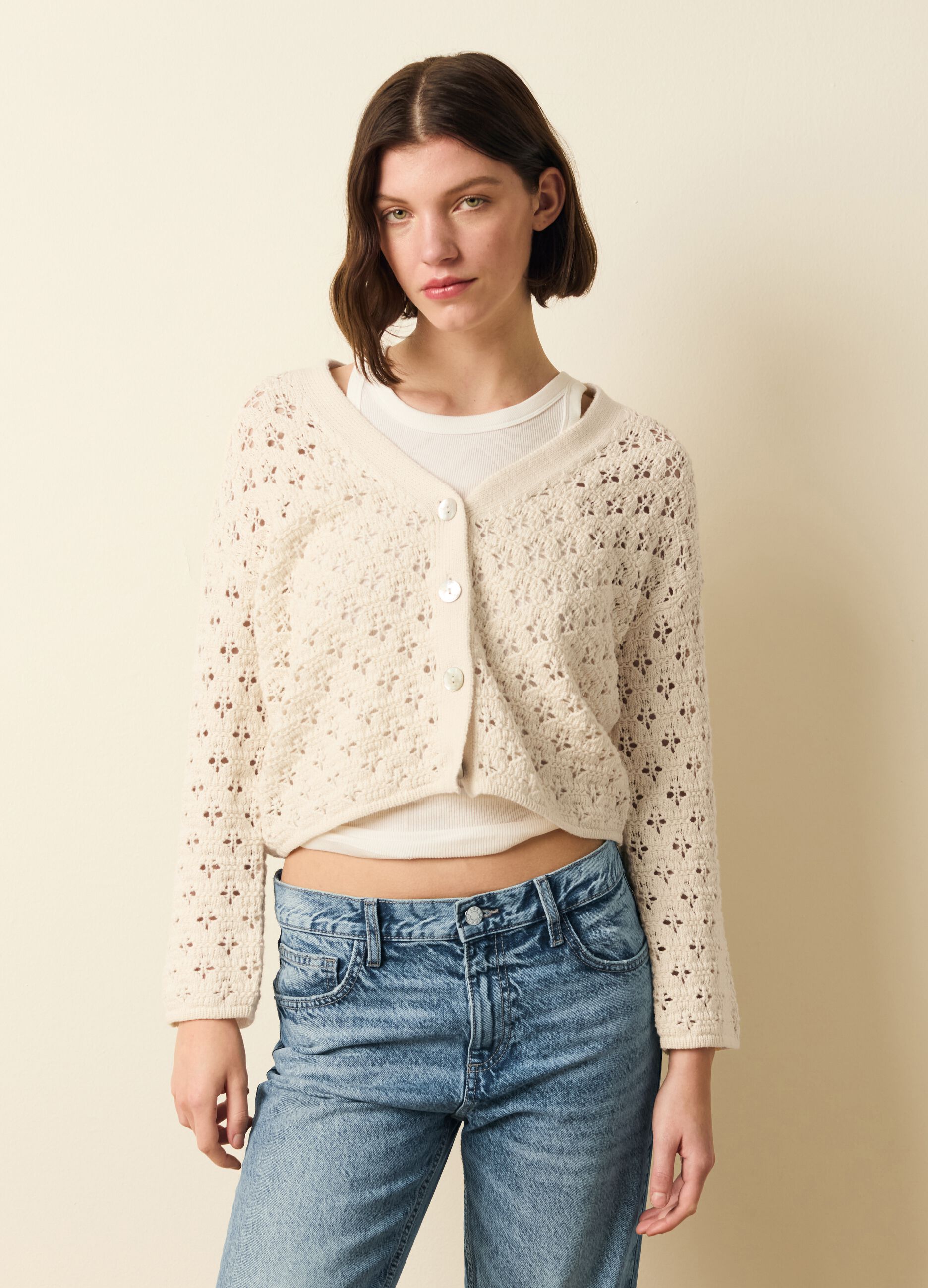 Cardigan crochet con scollo a V