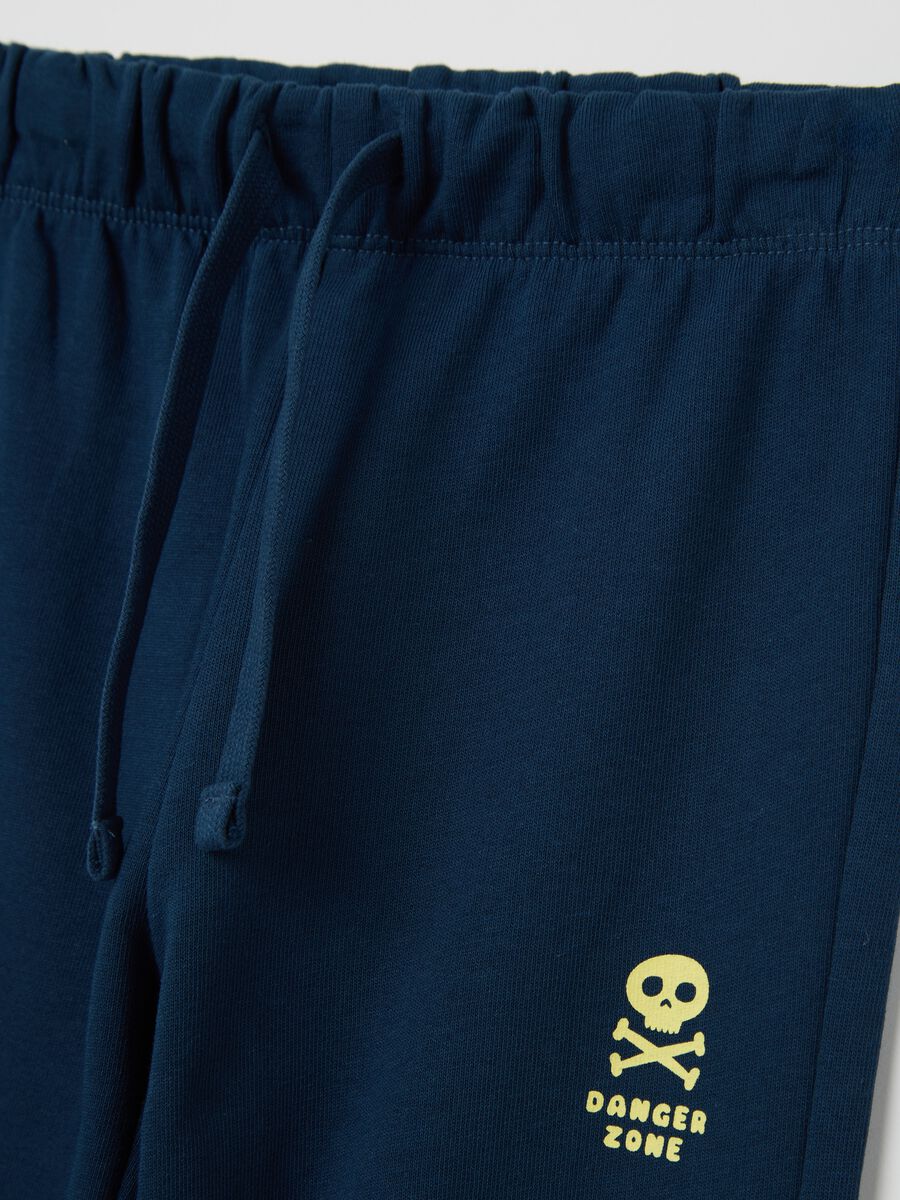 Blue cotton joggers with drawstring and print_2