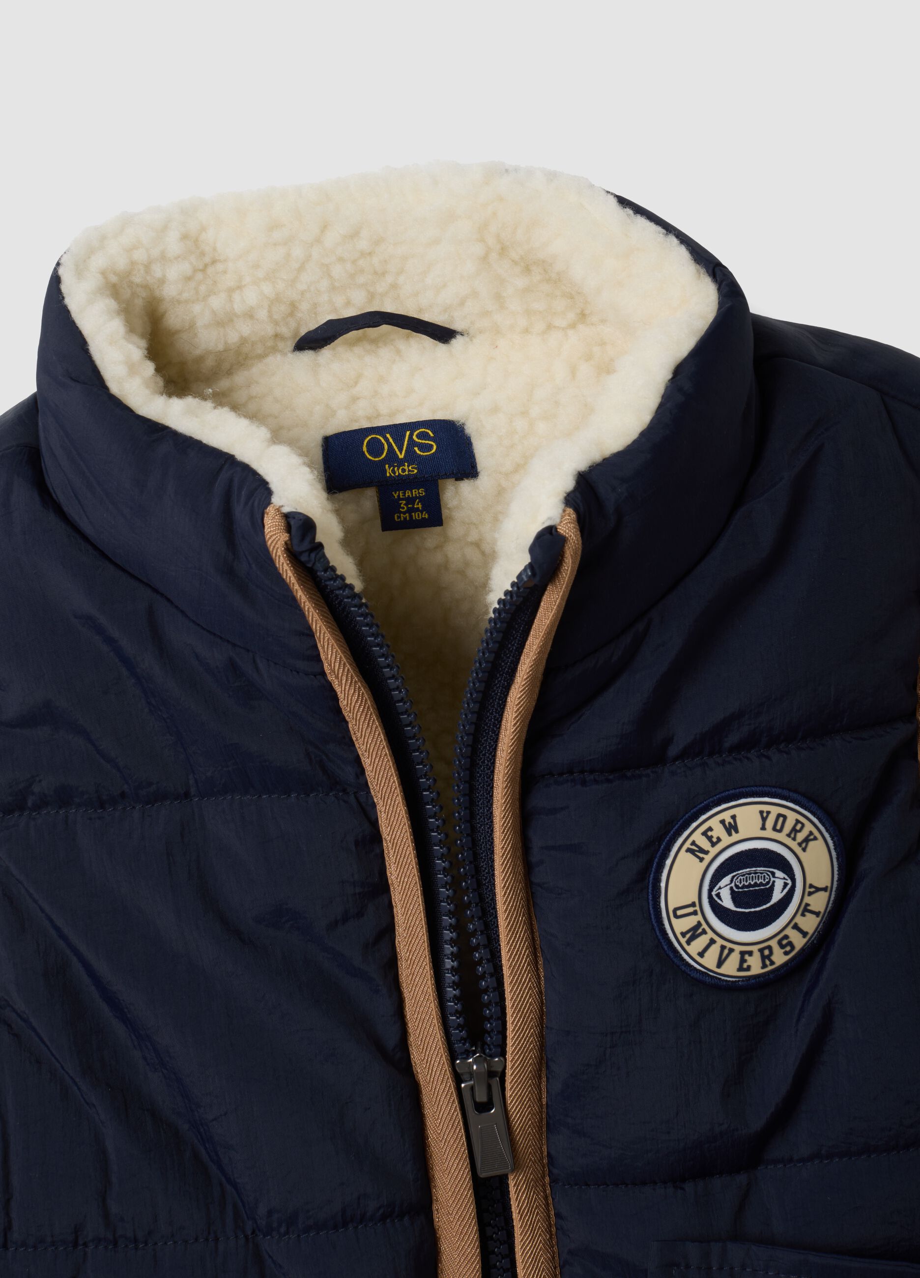 Gilet blu imbottito con zip e bordi a contrasto