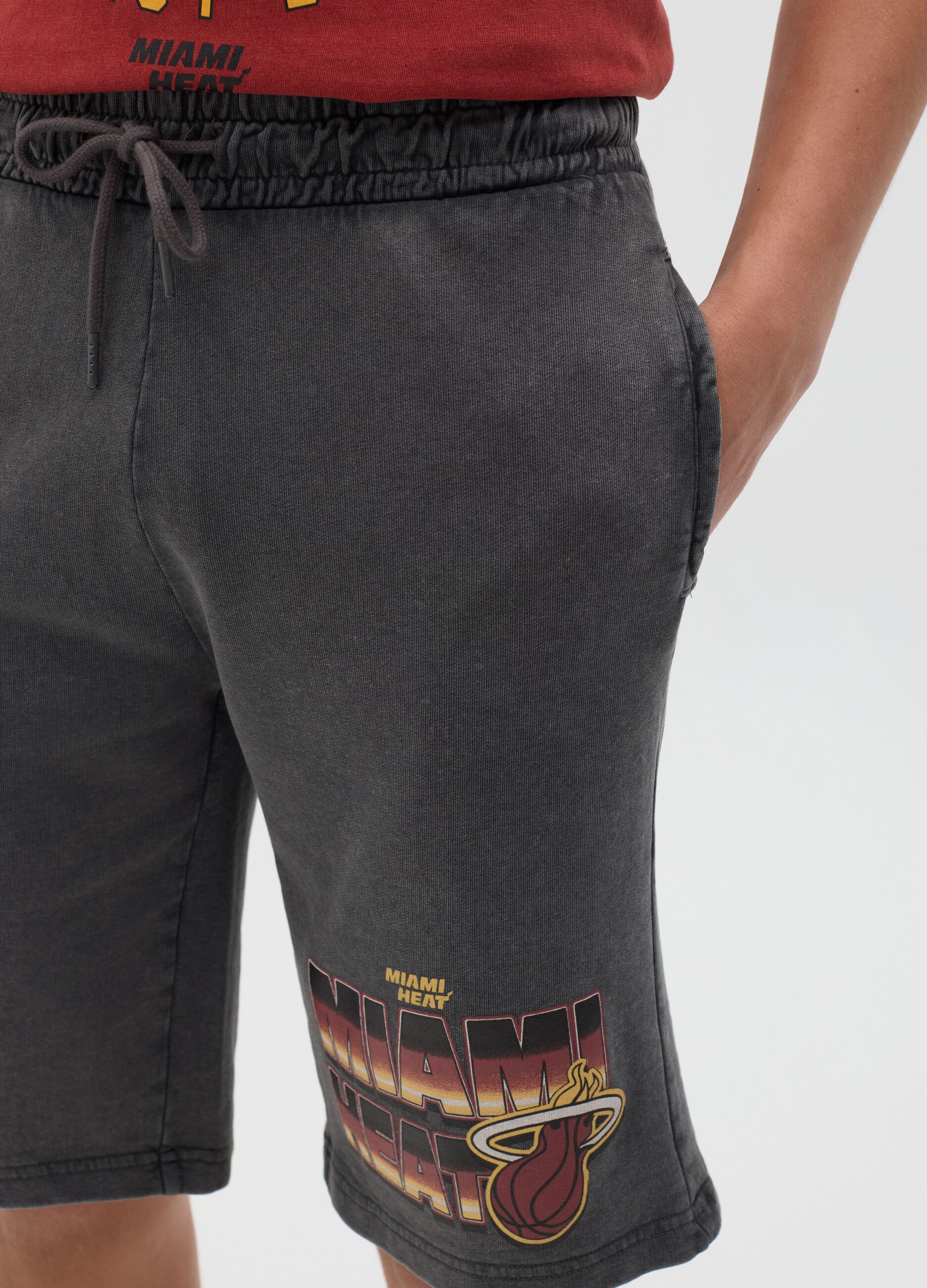 Grey sporty shorts with Miami Heat logo