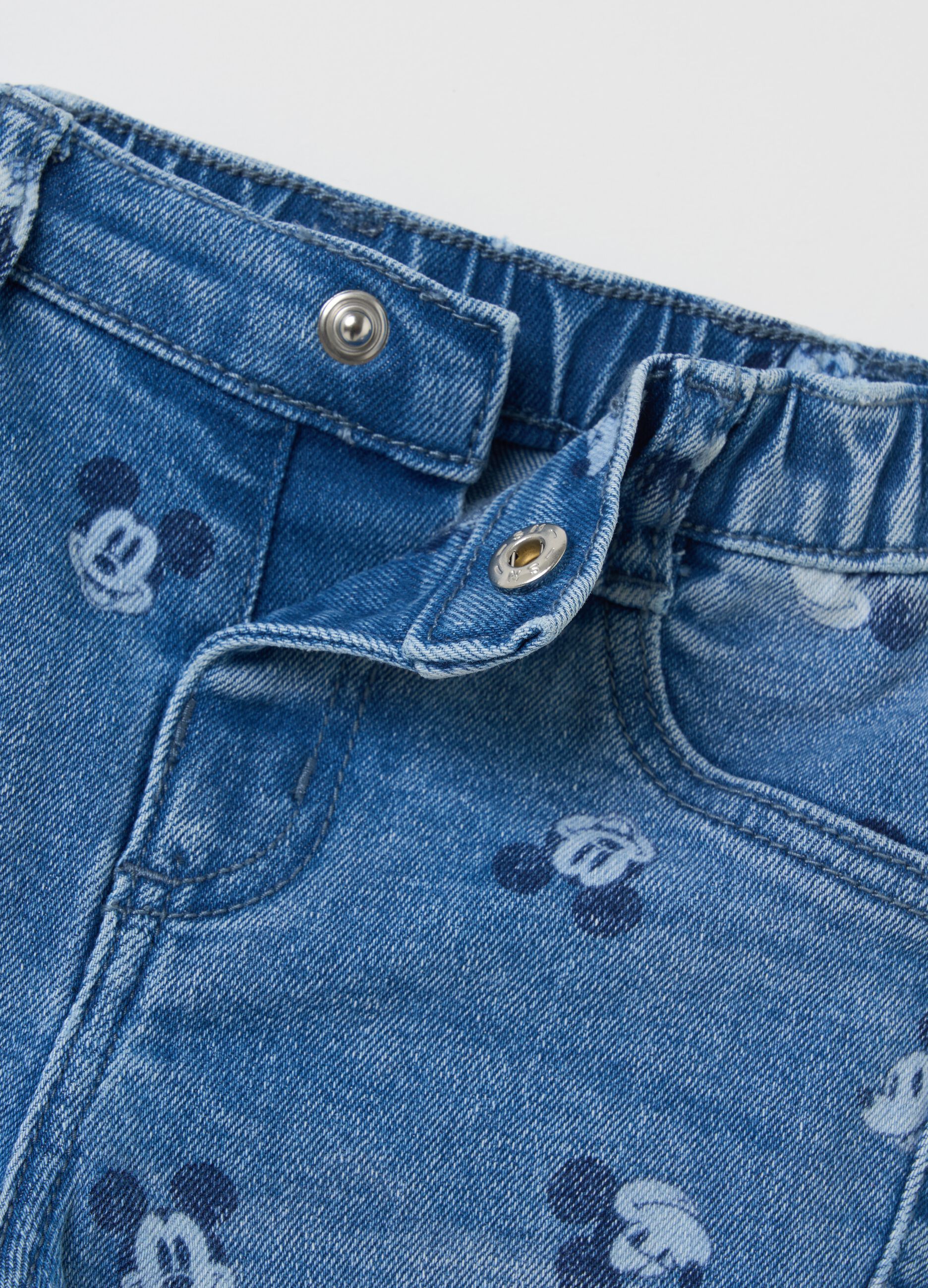 Jeans with all-over Mickey Mouse print