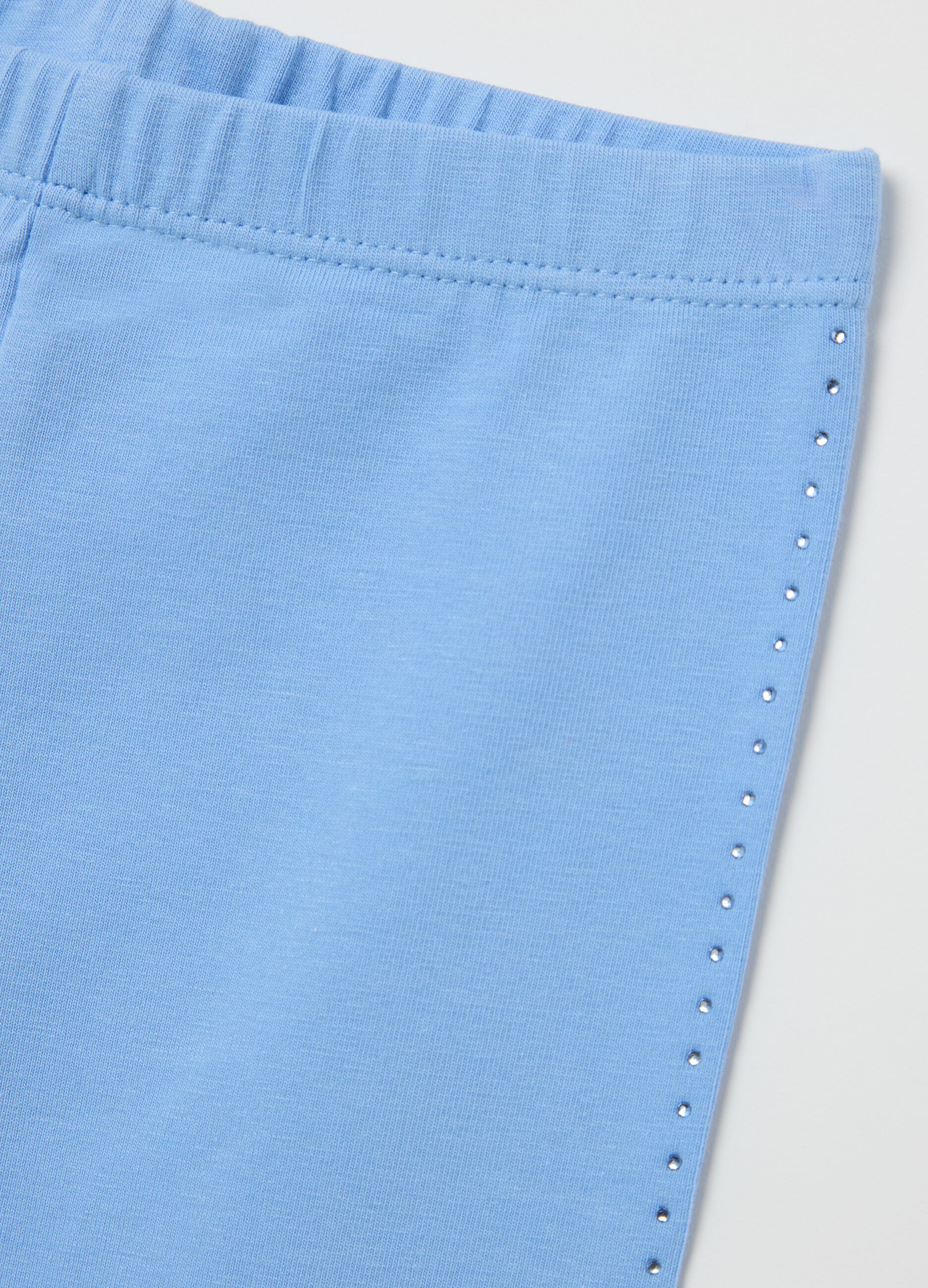 Light blue three-quarter stretch leggings with diamantés