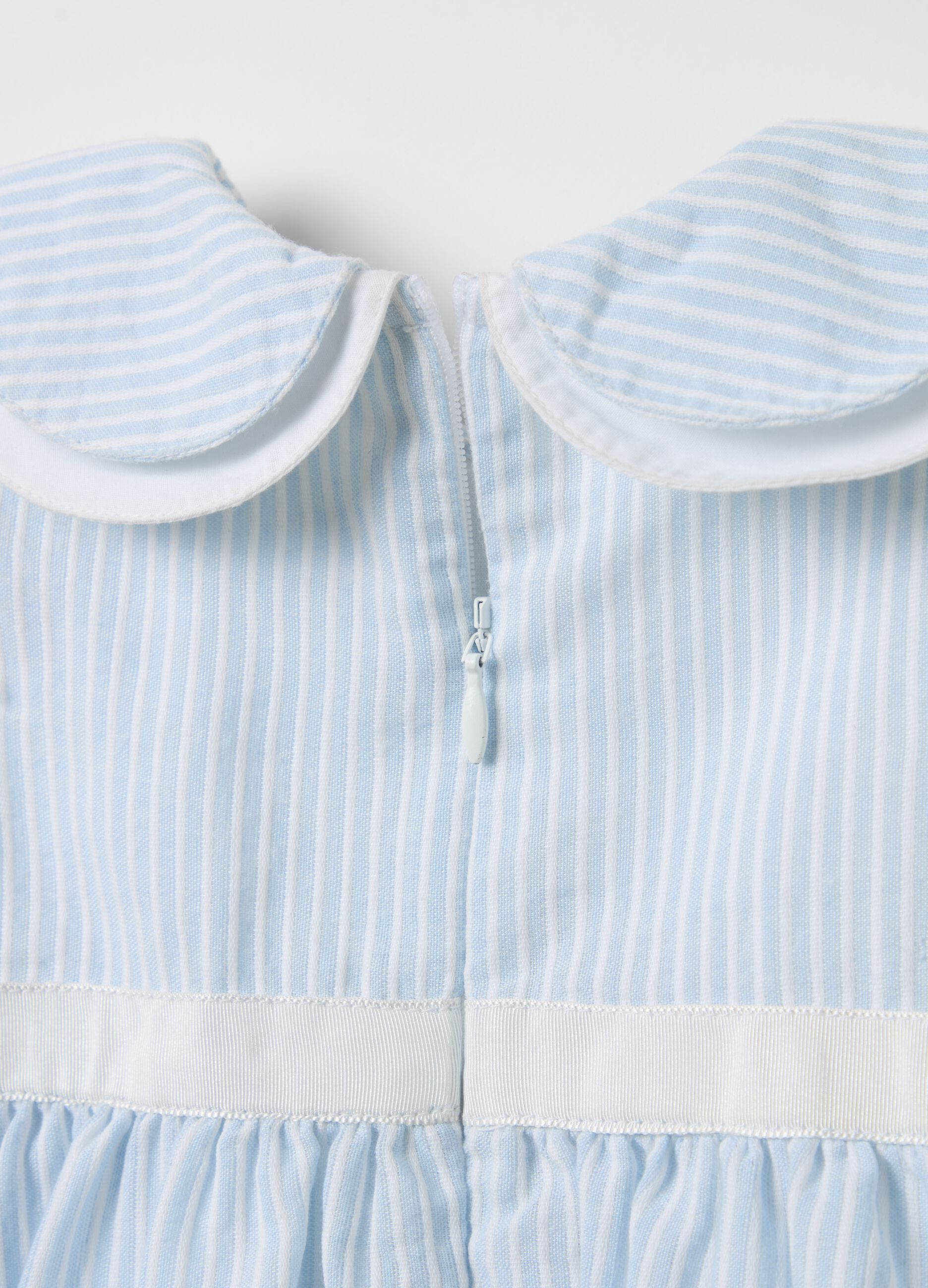Dress with striped pattern with bow