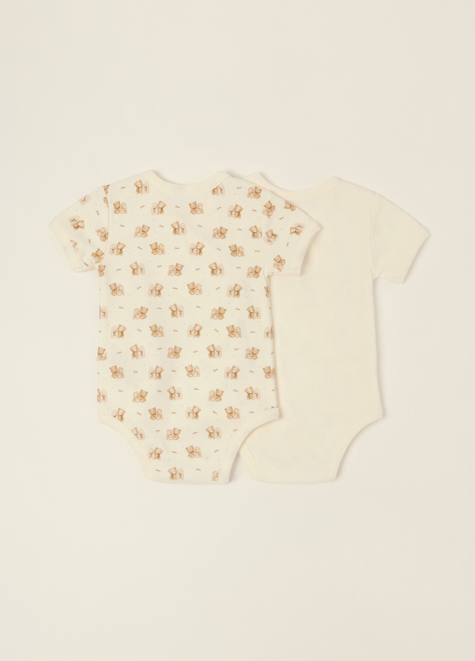 Two-pack of white pure cotton baby bodysuits with teddy bear print
