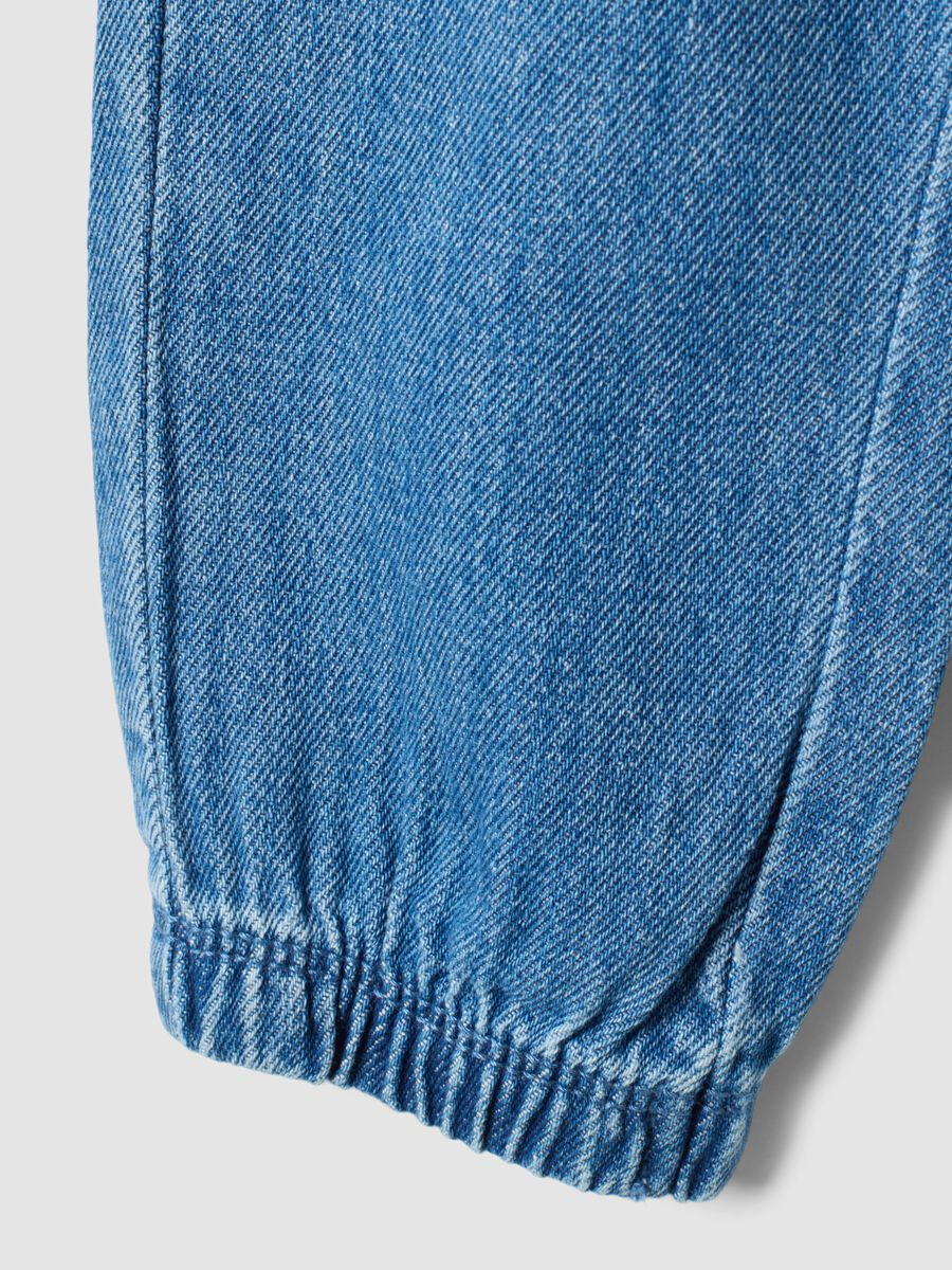 Blue denim trousers in a cotton and viscose blend with an elasticated waistband_3
