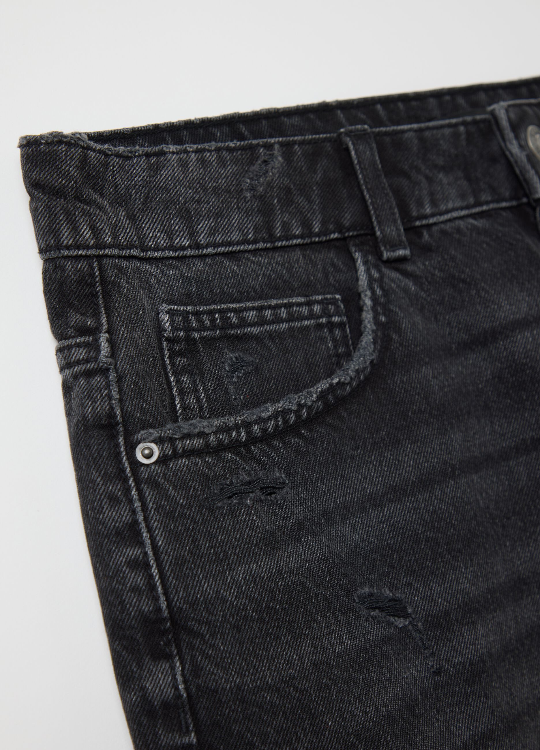Black denim shorts with ripped details