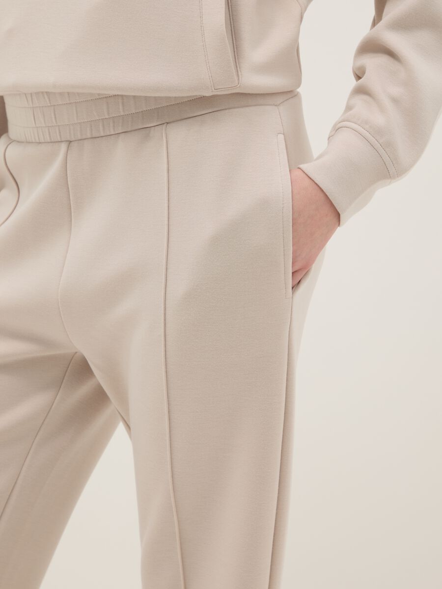 Beige wide leg trousers in stretch modal blend_3