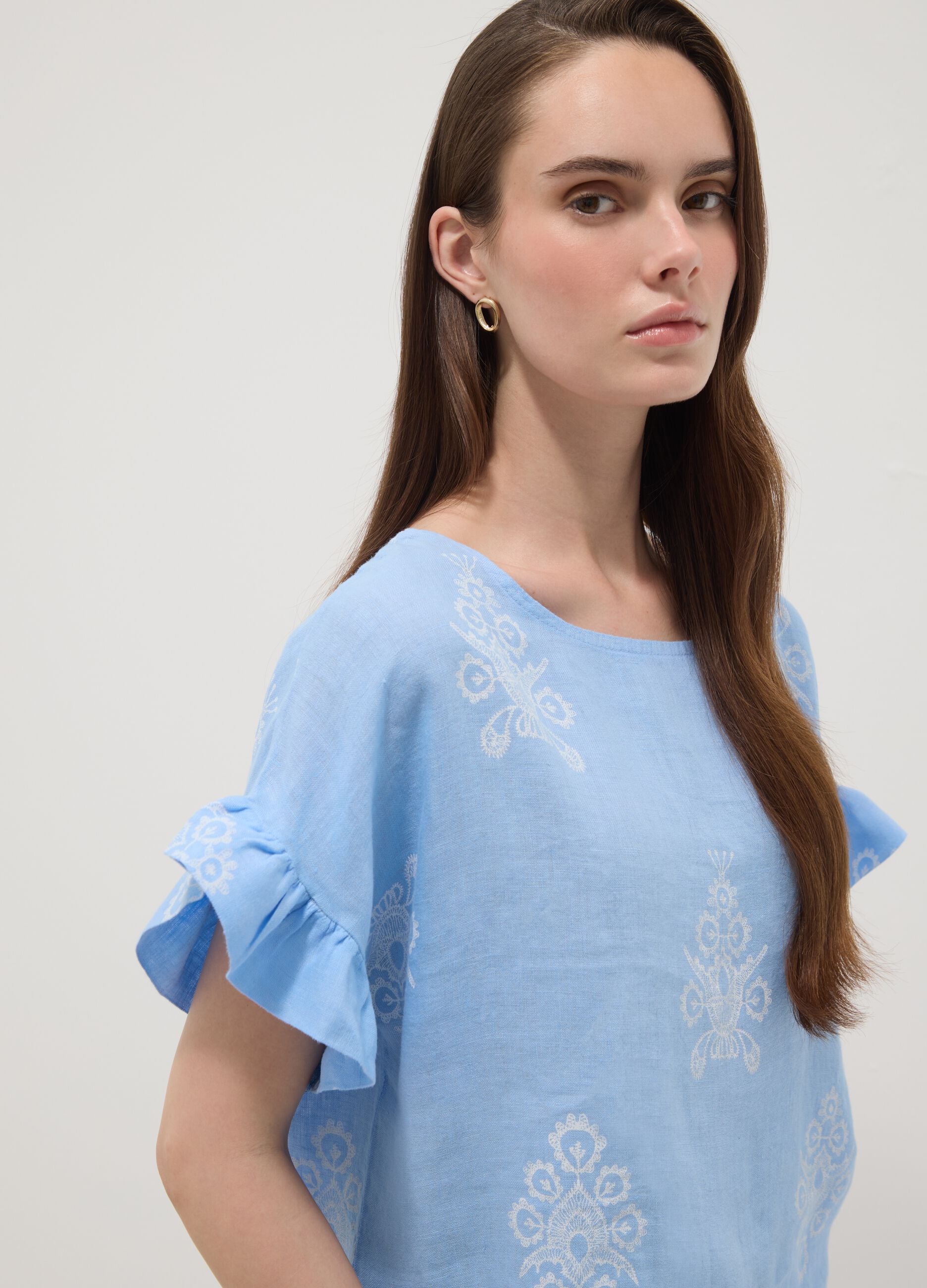 Light blue pure linen blouse with embroidery and ruffled sleeves, regular fit