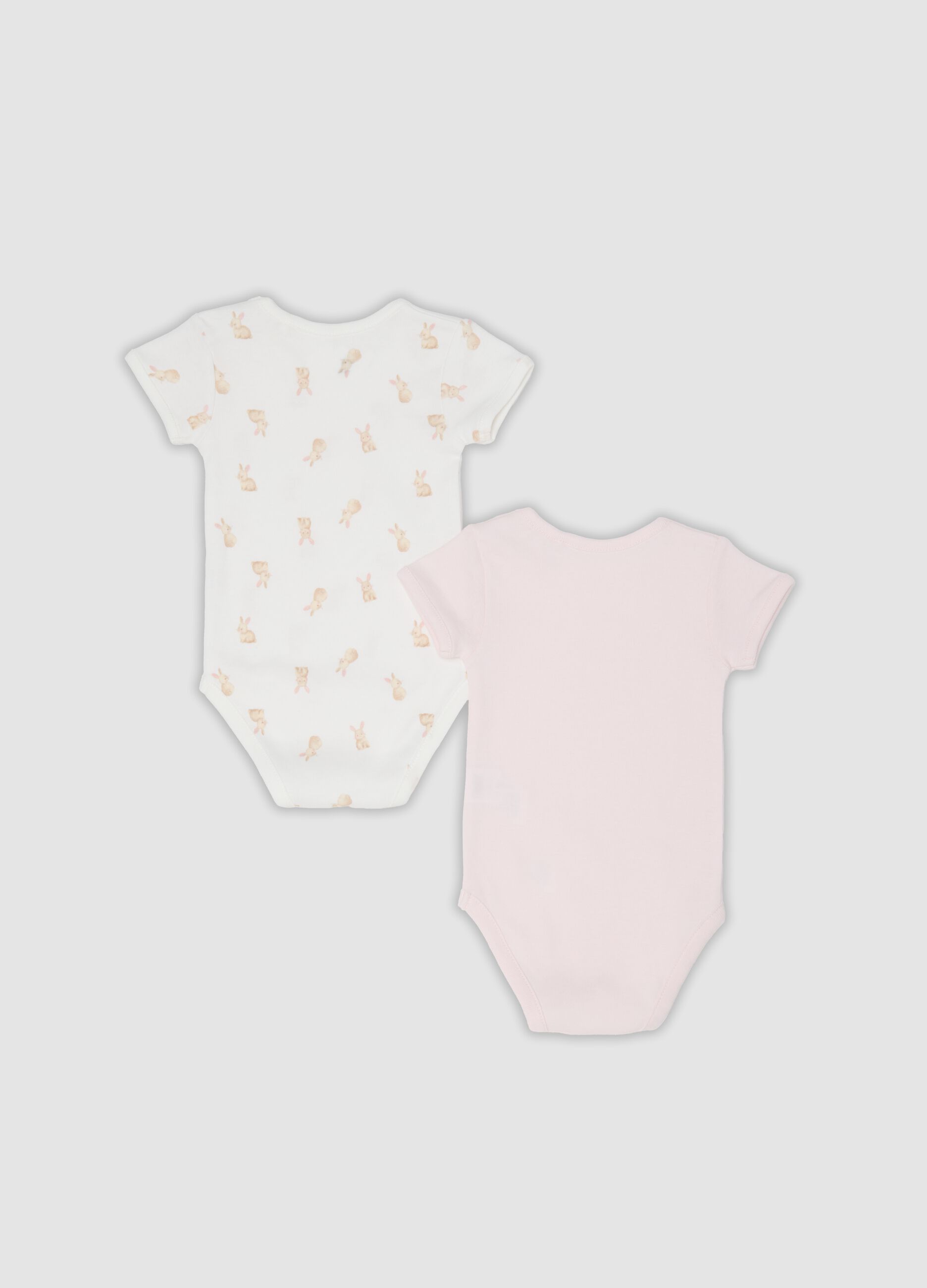 2-pack of pink and white organic cotton short-sleeve bodysuits for baby girls