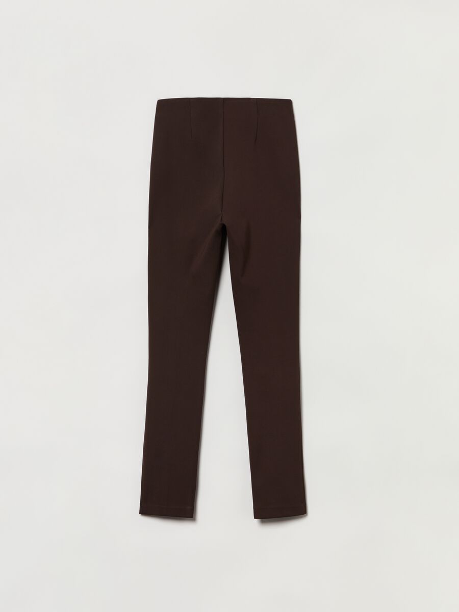 Leggings stretch con spacchi_1