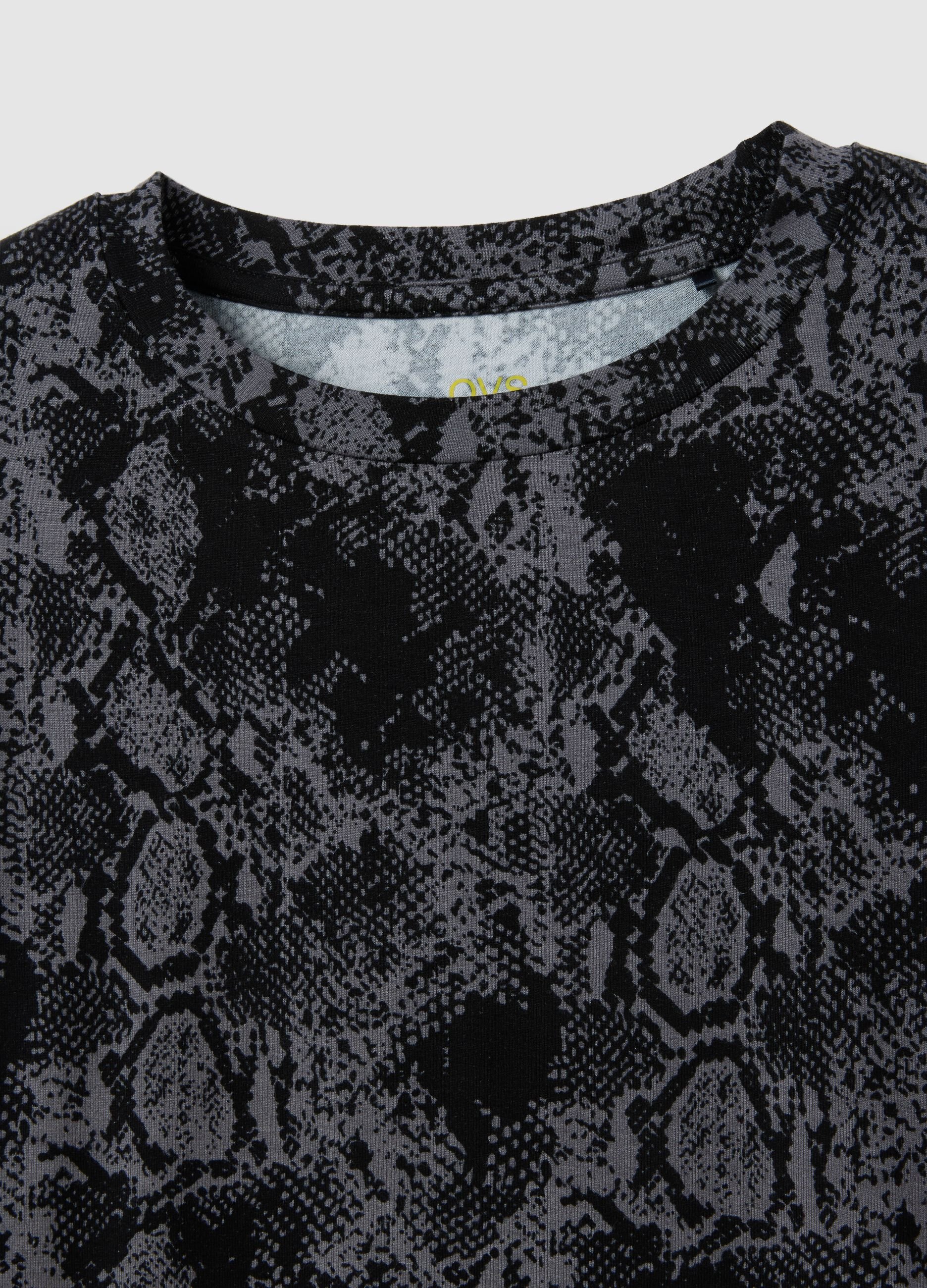 Maglia a maniche lunghe nero con stampa serpente