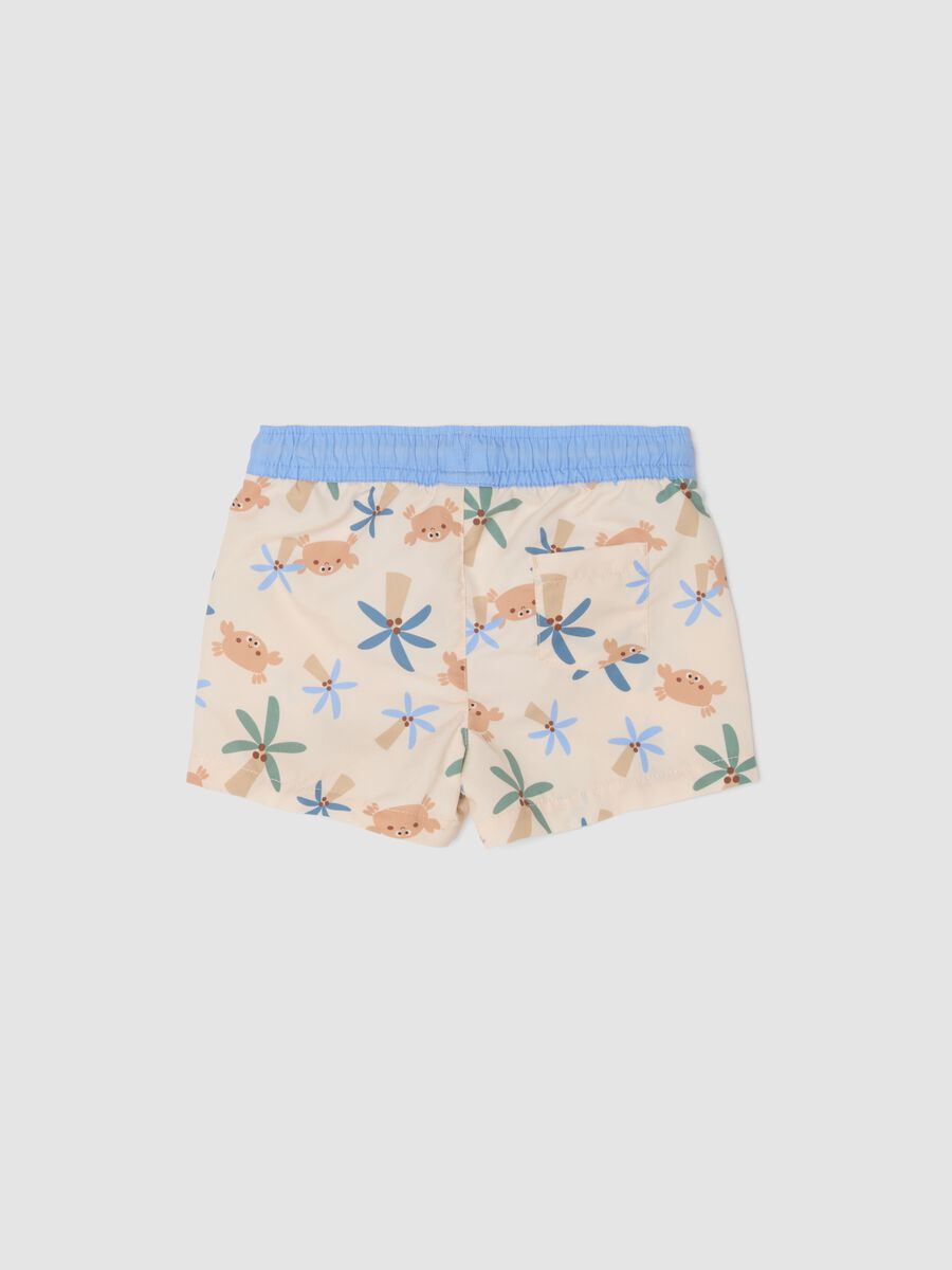 Costume shorts beige da mare con stampa tropicale per bimbo_1