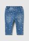 Jeans with all-over Mickey Mouse print_1