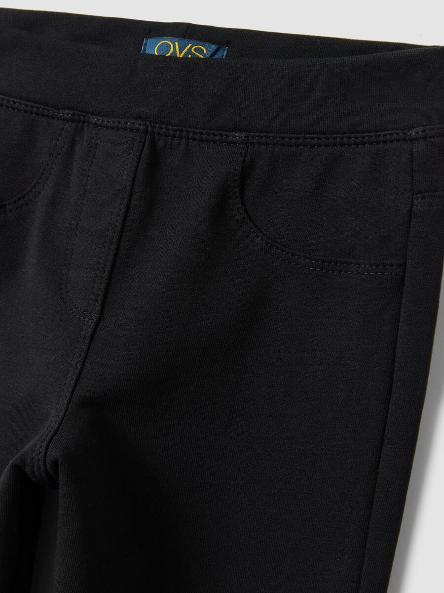 Treggings neri in cotone organico elasticizzato slim fit per bambina_2