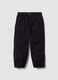 Pantaloni neri in cotone elasticizzato con fondo elasticizzato per bambino_5
