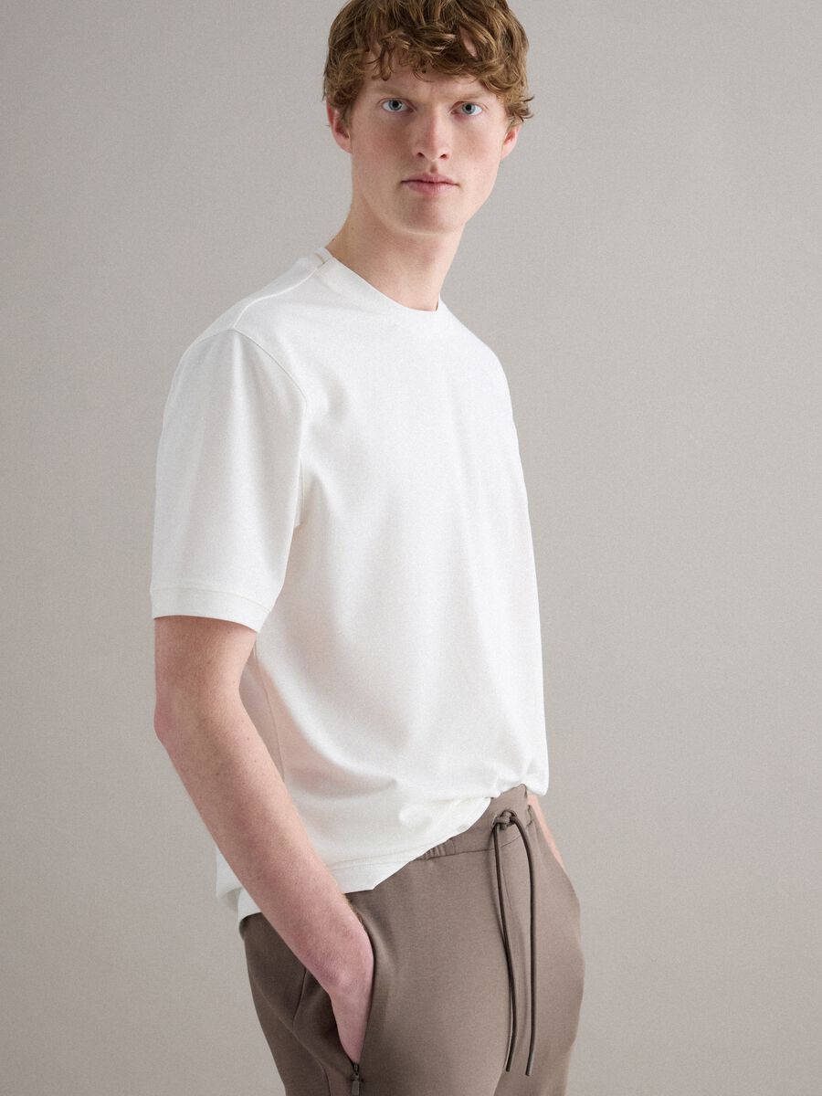 T-shirt girocollo in cotone elasticizzato bianca relaxed fit_0