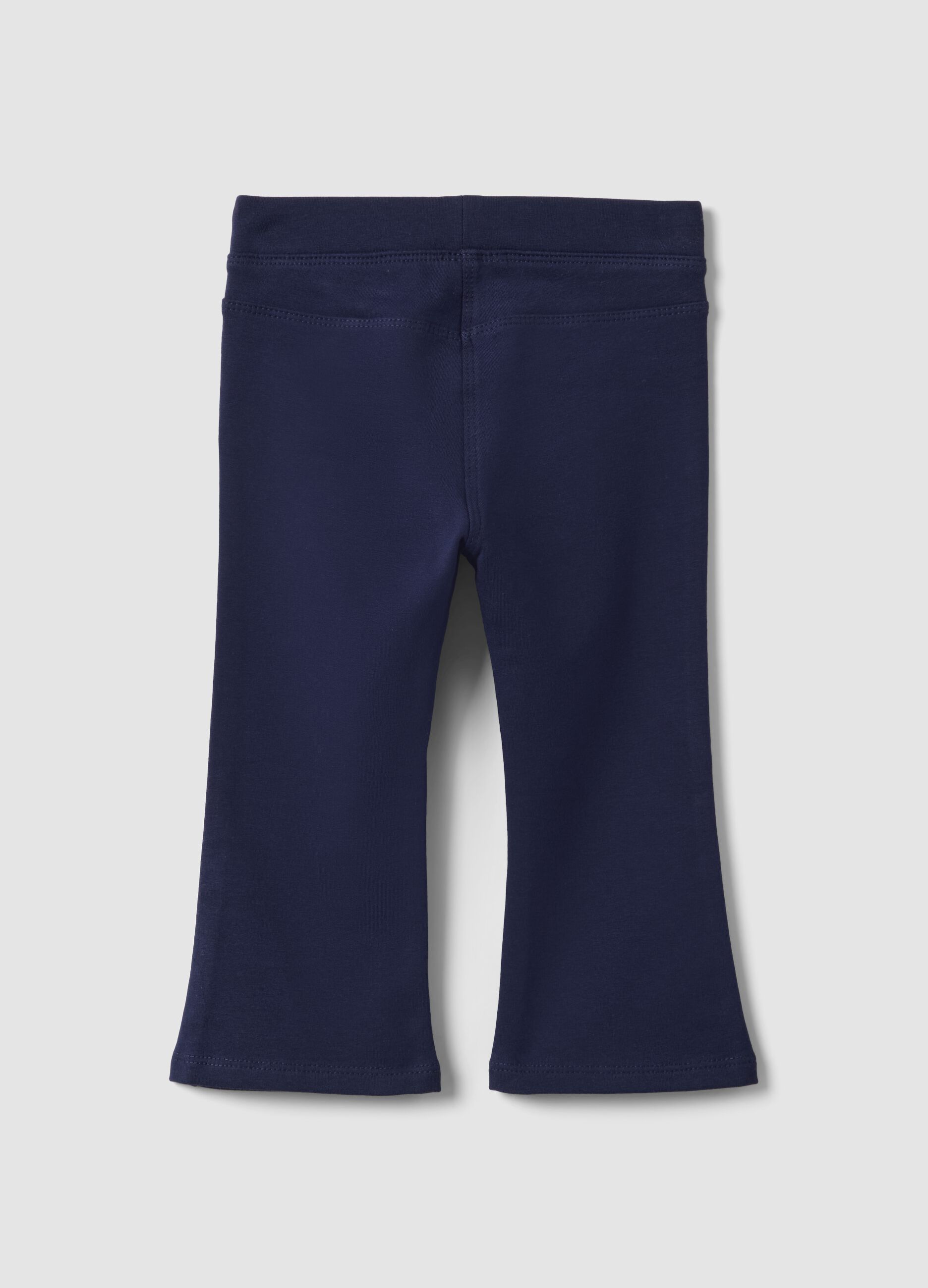 Pantaloni flare blu in cotone organico elasticizzato per bimba